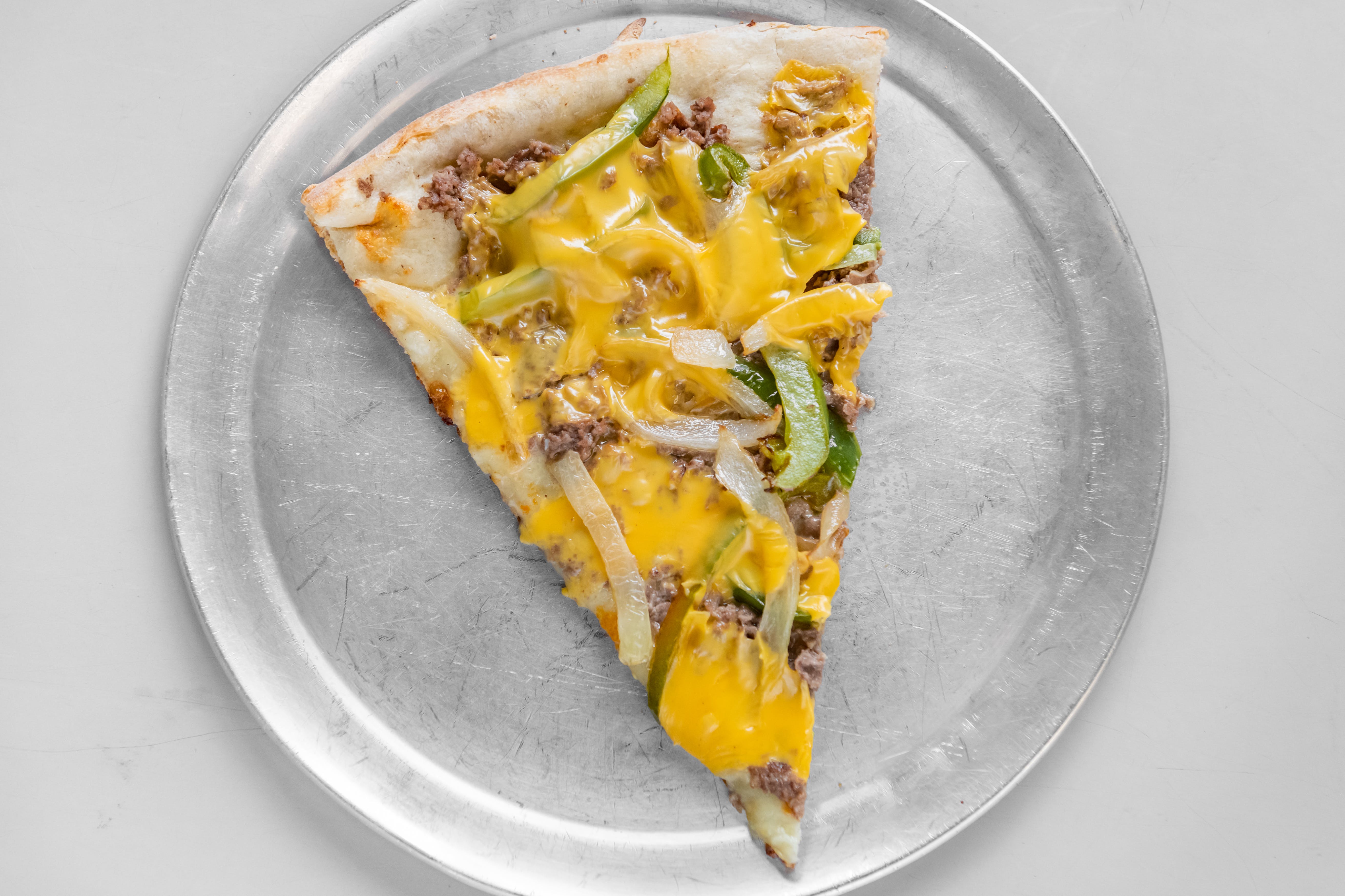 Order Cheesesteak Pizza - Personal 10'' food online from Gino's Pizzeria store, Jersey City on bringmethat.com