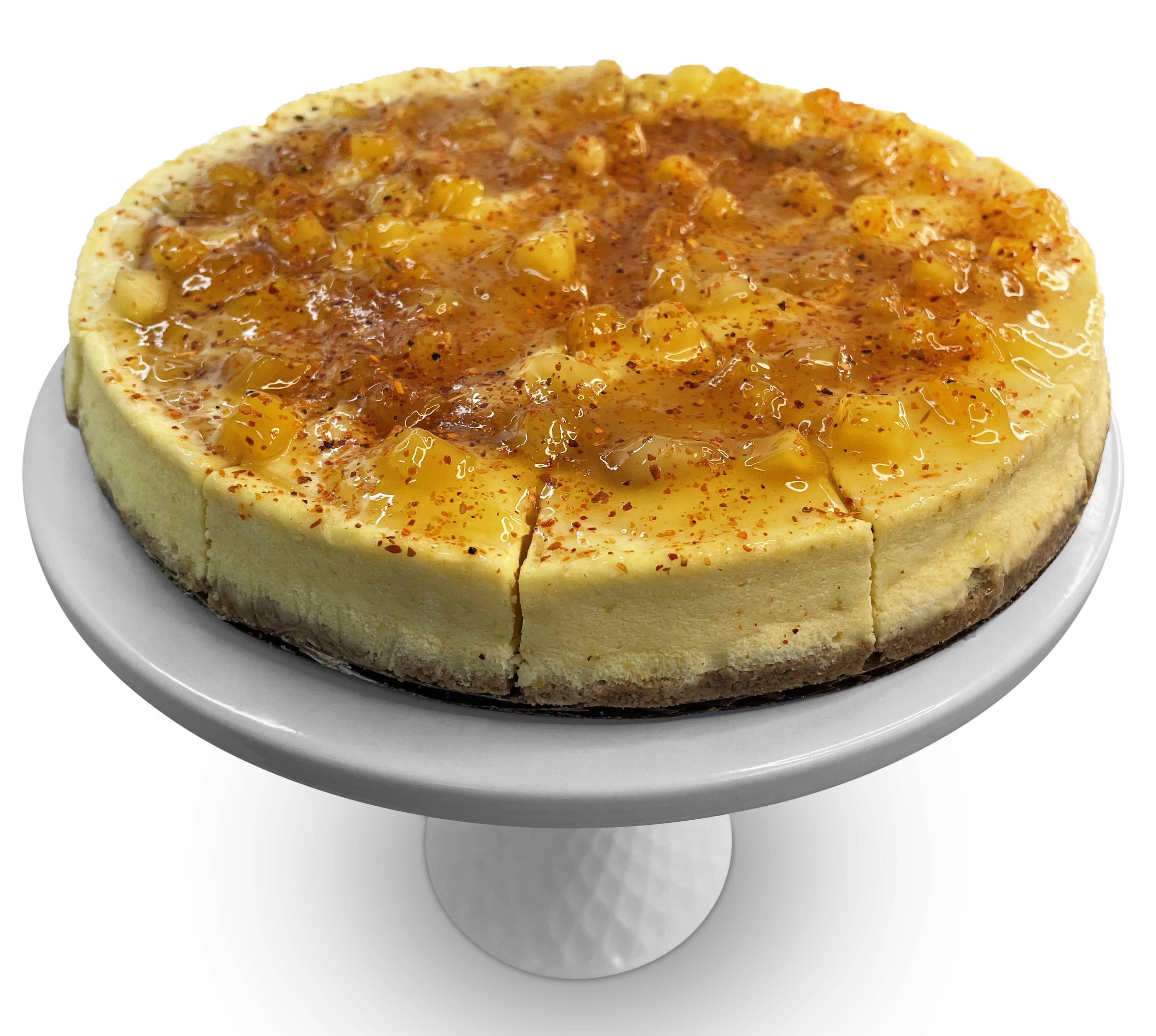 Order TANGY MANGO CHEESECAKE 9" - 2 LBS GIFT BOX food online from Andy Anand Chocolates store, Chino on bringmethat.com