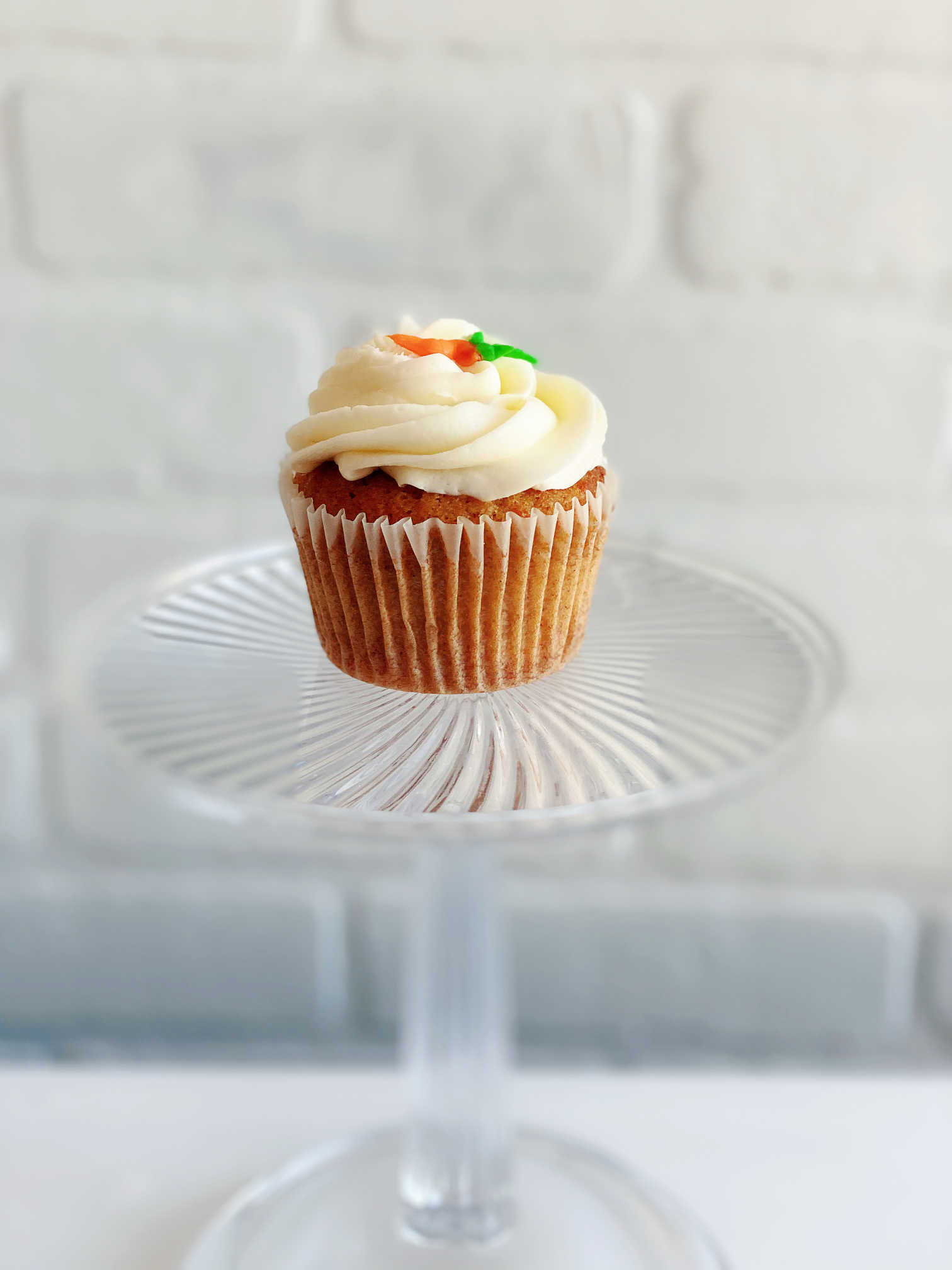 Order Carrot Cake Cupcake food online from Sugar Blossom Bake Shop store, San Clemente on bringmethat.com