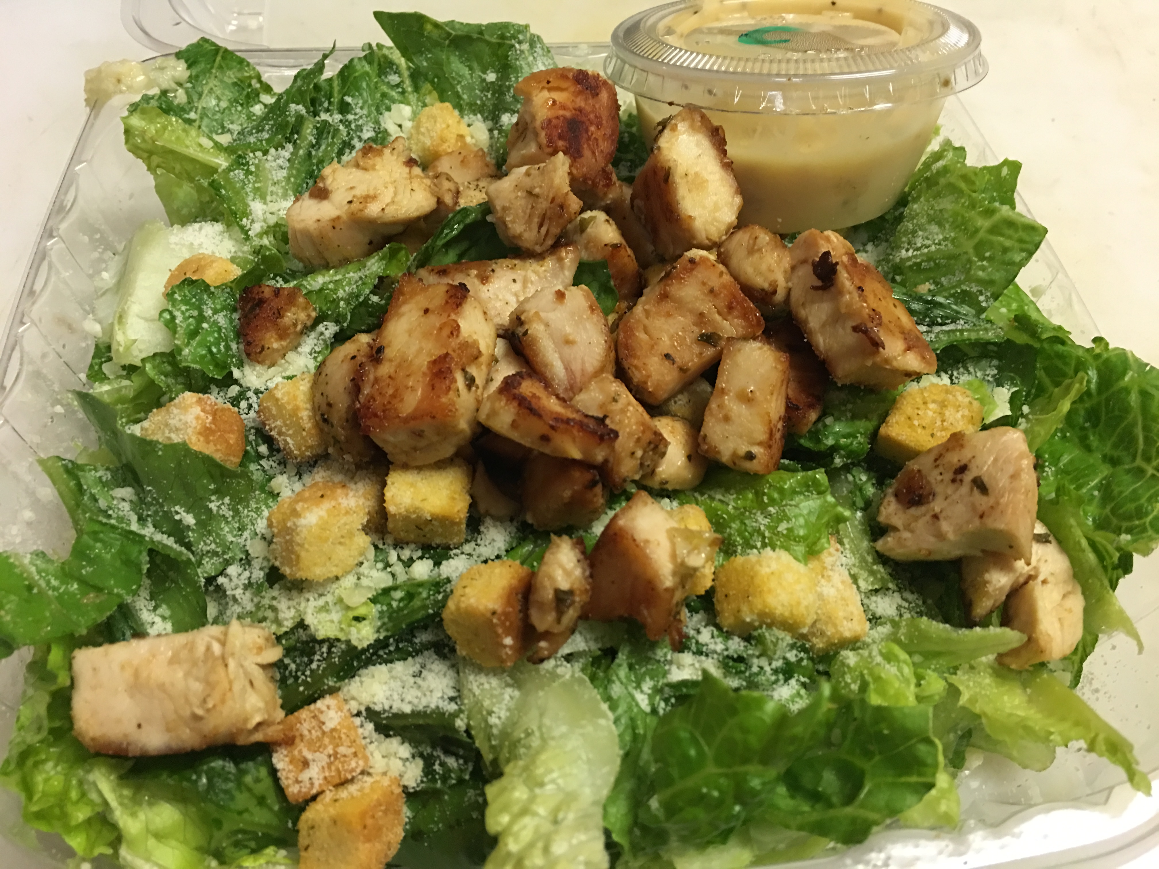Order Grilled Chicken Caesar Salad food online from MC's Pizza LLC store, East Providence on bringmethat.com