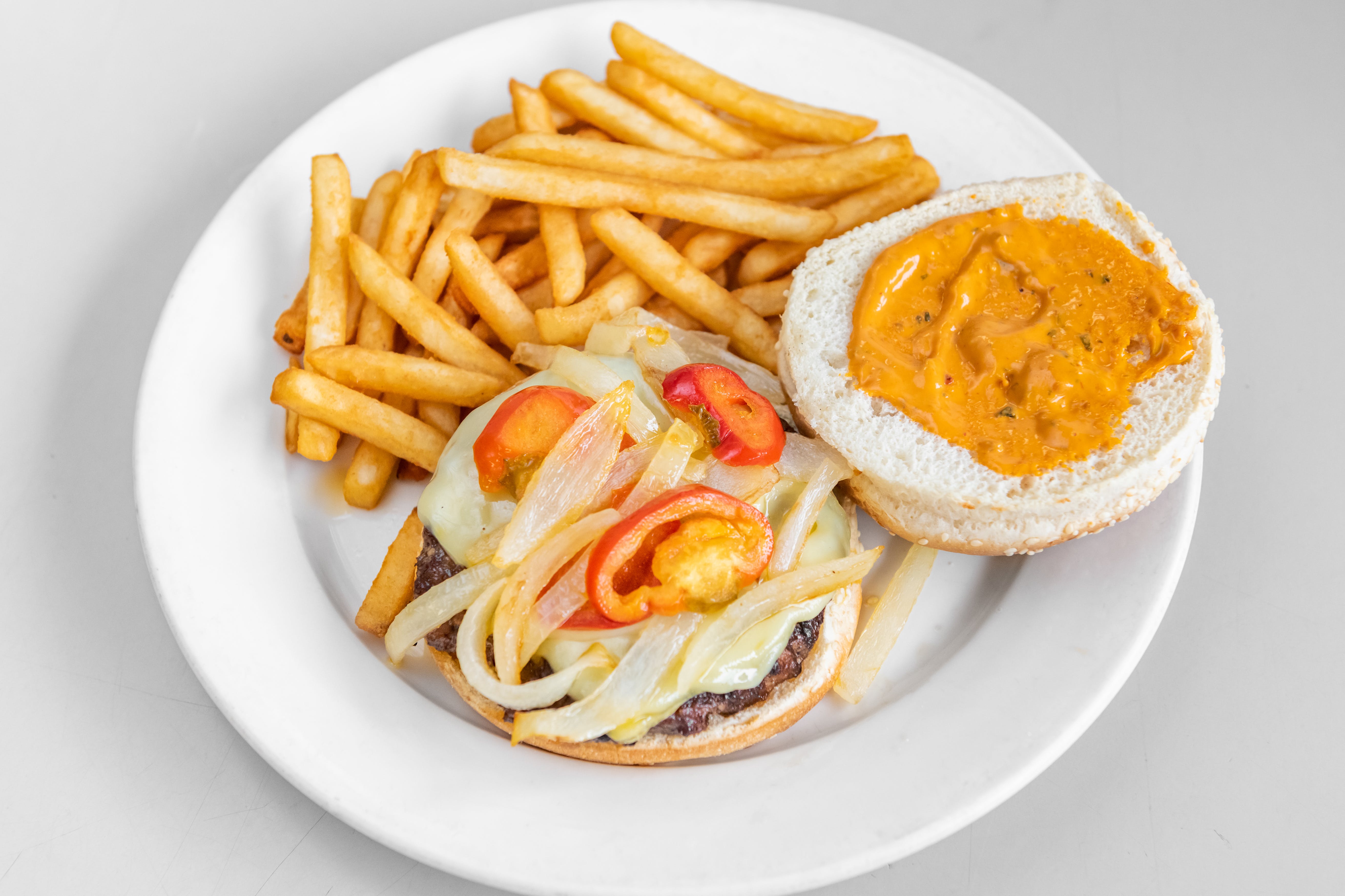 Order Cheeseburger - Burgers food online from Gino's Pizzeria store, Jersey City on bringmethat.com