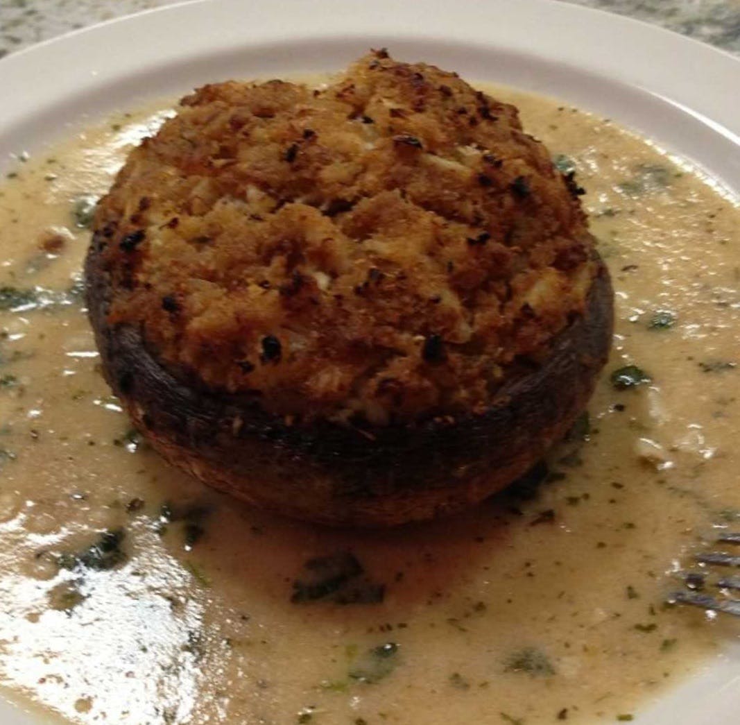 Order Stuffed Portobello Mushrooms with Crab Meat - Appetizer food online from Ciro Pizza Cafe store, Staten Island on bringmethat.com