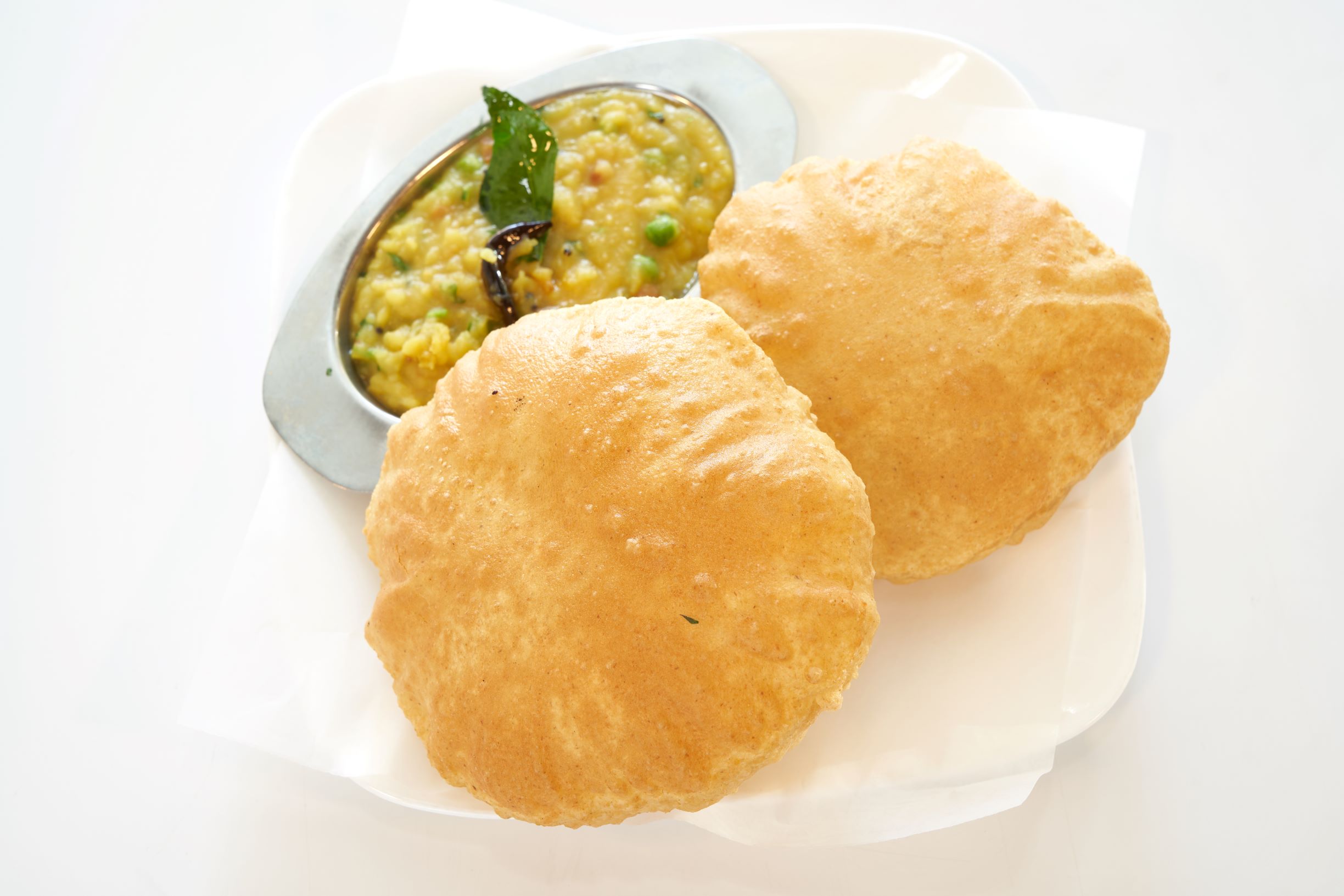 Order 2 Pieces Puri with Channa Masala food online from Annapurna Grill store, Pasadena on bringmethat.com