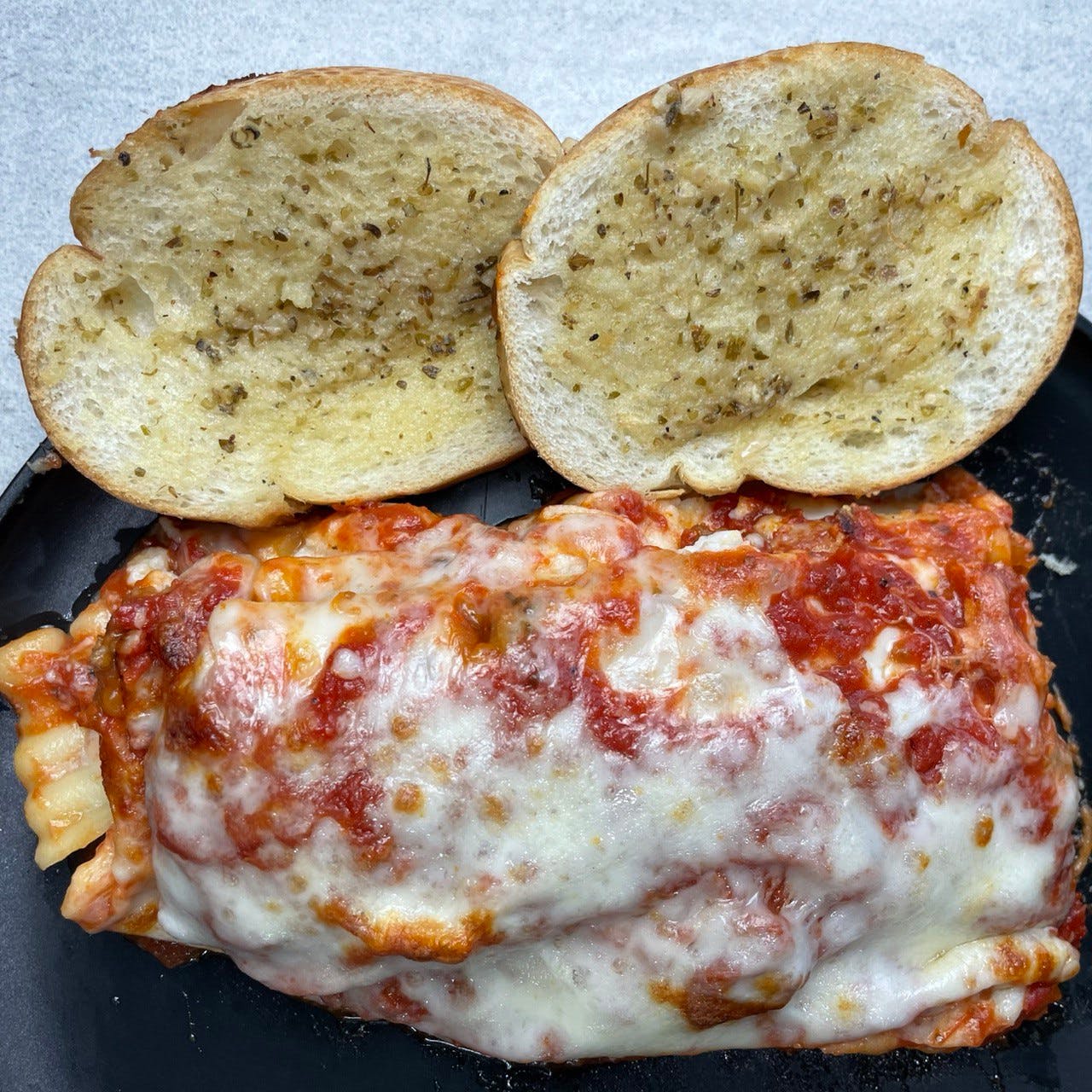 Order Meat Lasagna - Pasta food online from Troys Italian Kitchen store, Arlington on bringmethat.com