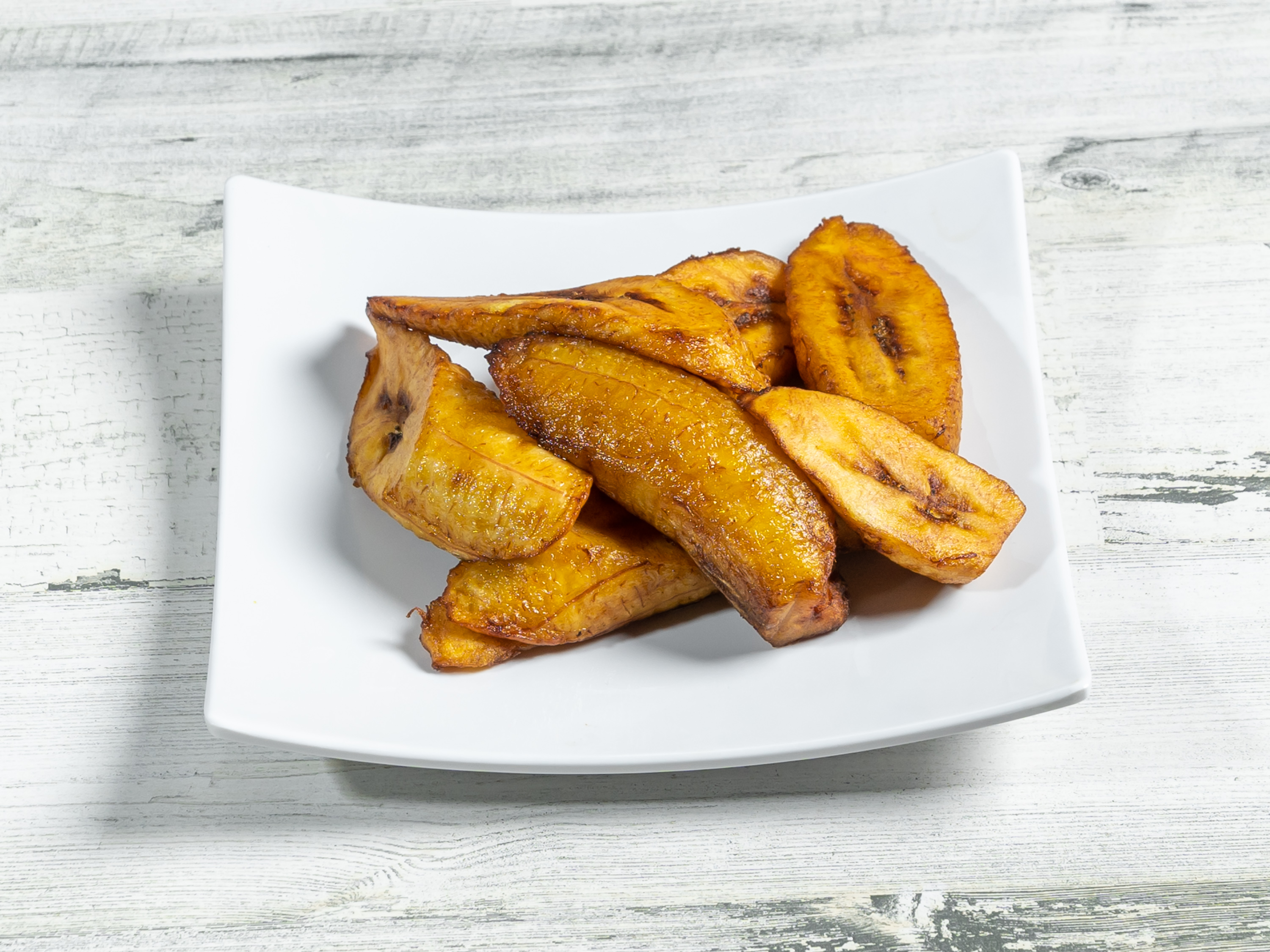 Order Fried Plantain food online from Aso Rock African Restaurant store, Dallas on bringmethat.com