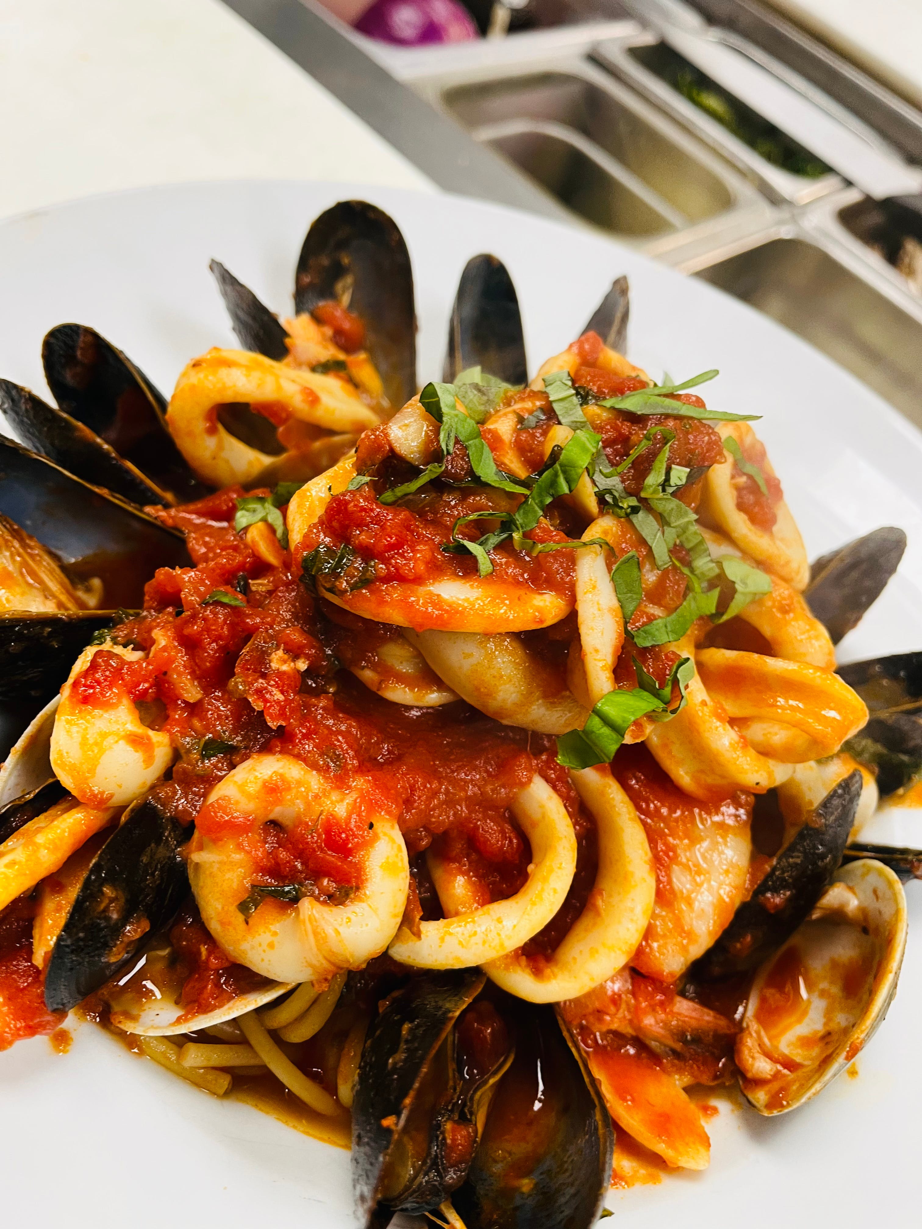 Order Seafood Pasta - Pasta food online from Amici Pizza store, Peekskill on bringmethat.com