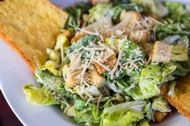 Order Caesar Salad food online from Papa Luigi's Pizza store, Cudahy on bringmethat.com