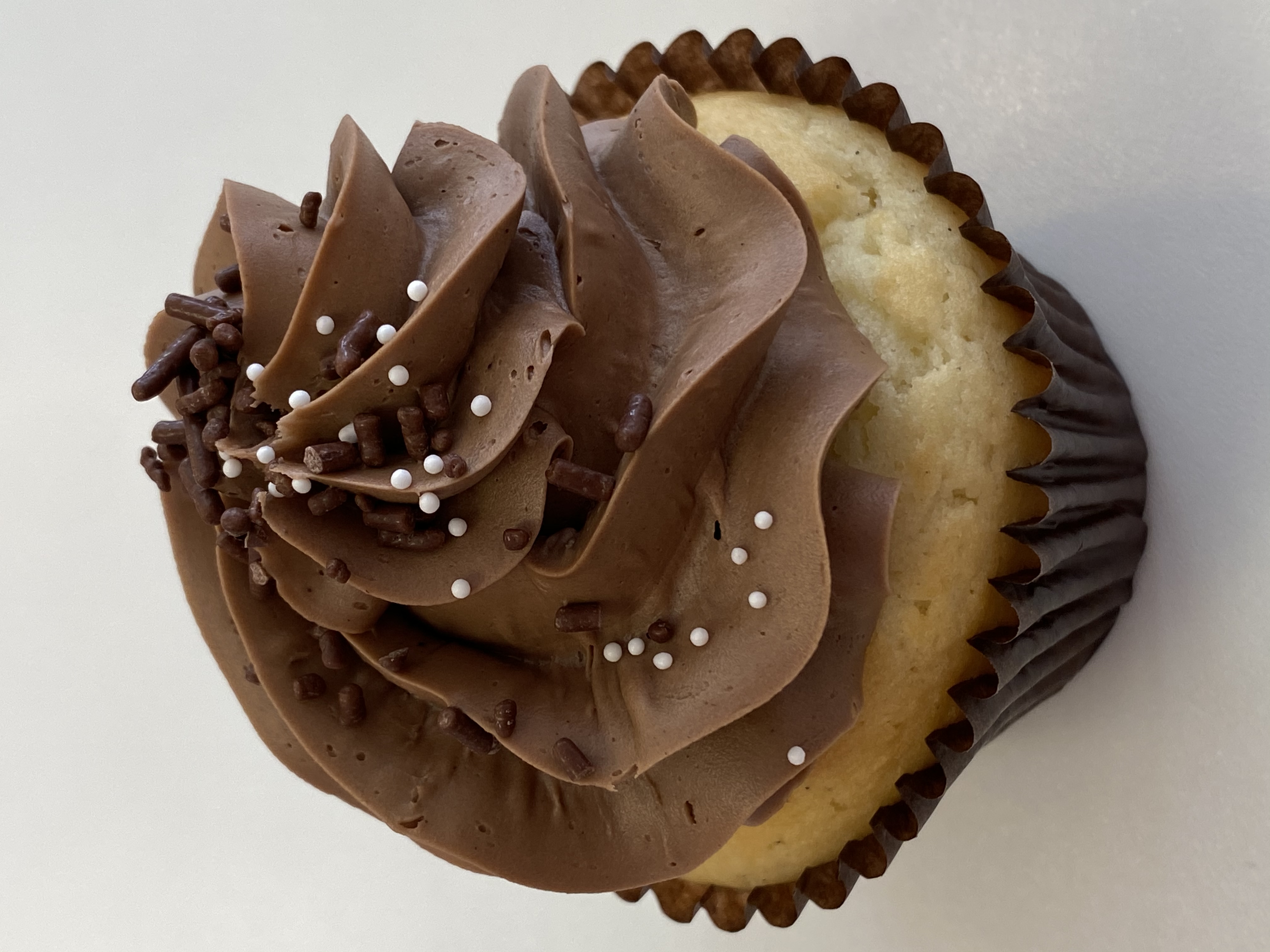Order Vanilla and Chocolate Cupcake food online from Smallcakes store, Richmond on bringmethat.com
