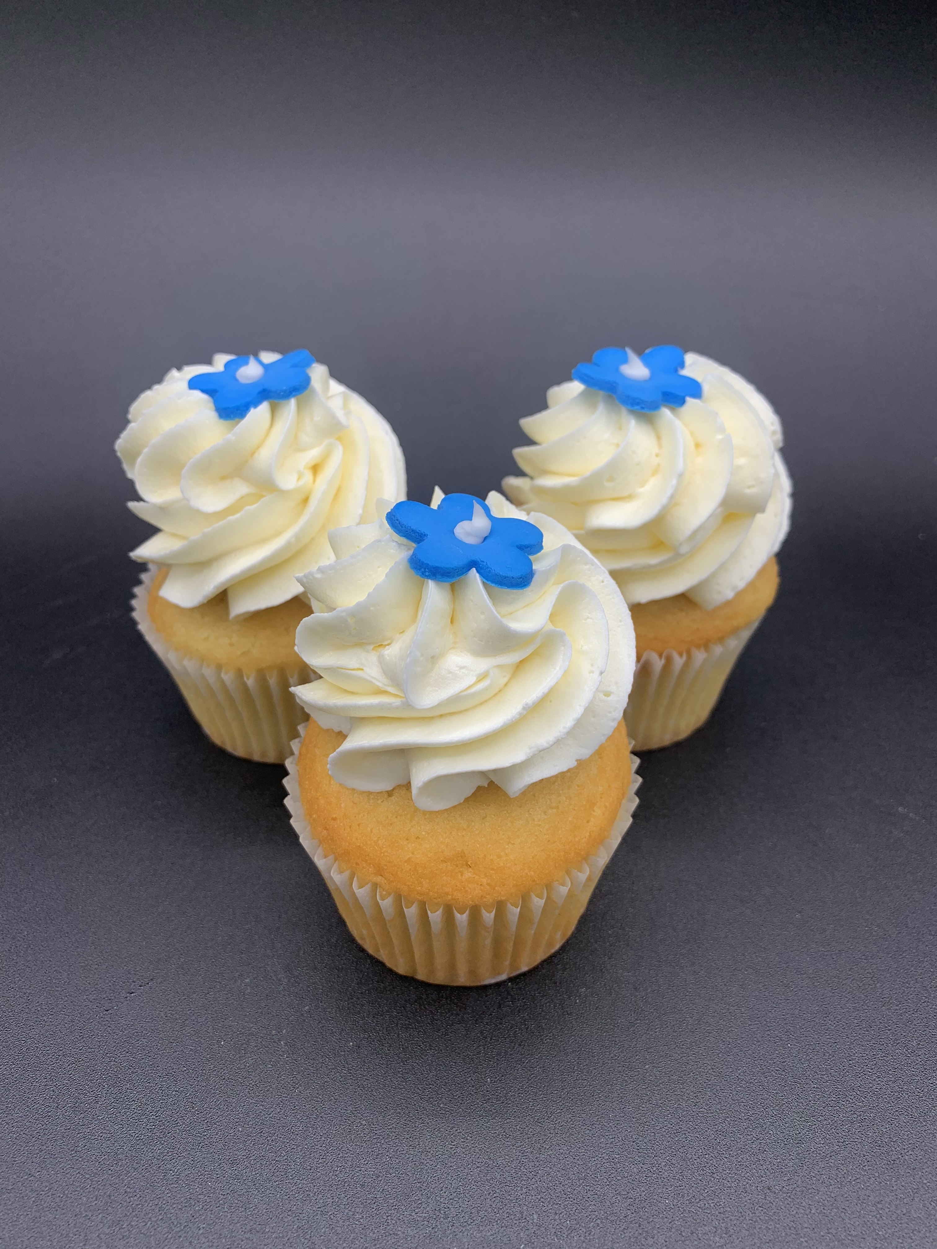 Order Vanilla Cupcake food online from Sweet Tooth store, Fayetteville on bringmethat.com