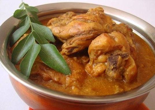 Order Chicken curry (with bone) food online from Baisakhi Dhaba store, Johnson City on bringmethat.com