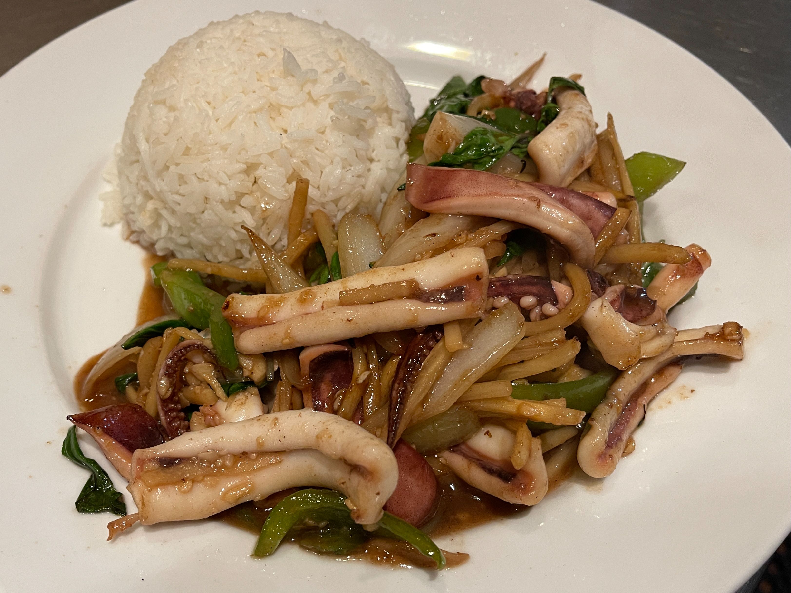 Order Basil Jumbo Squid (กะเพราปลาหมึก) food online from Ping Yang Thai Grill & Dessert store, San Francisco on bringmethat.com