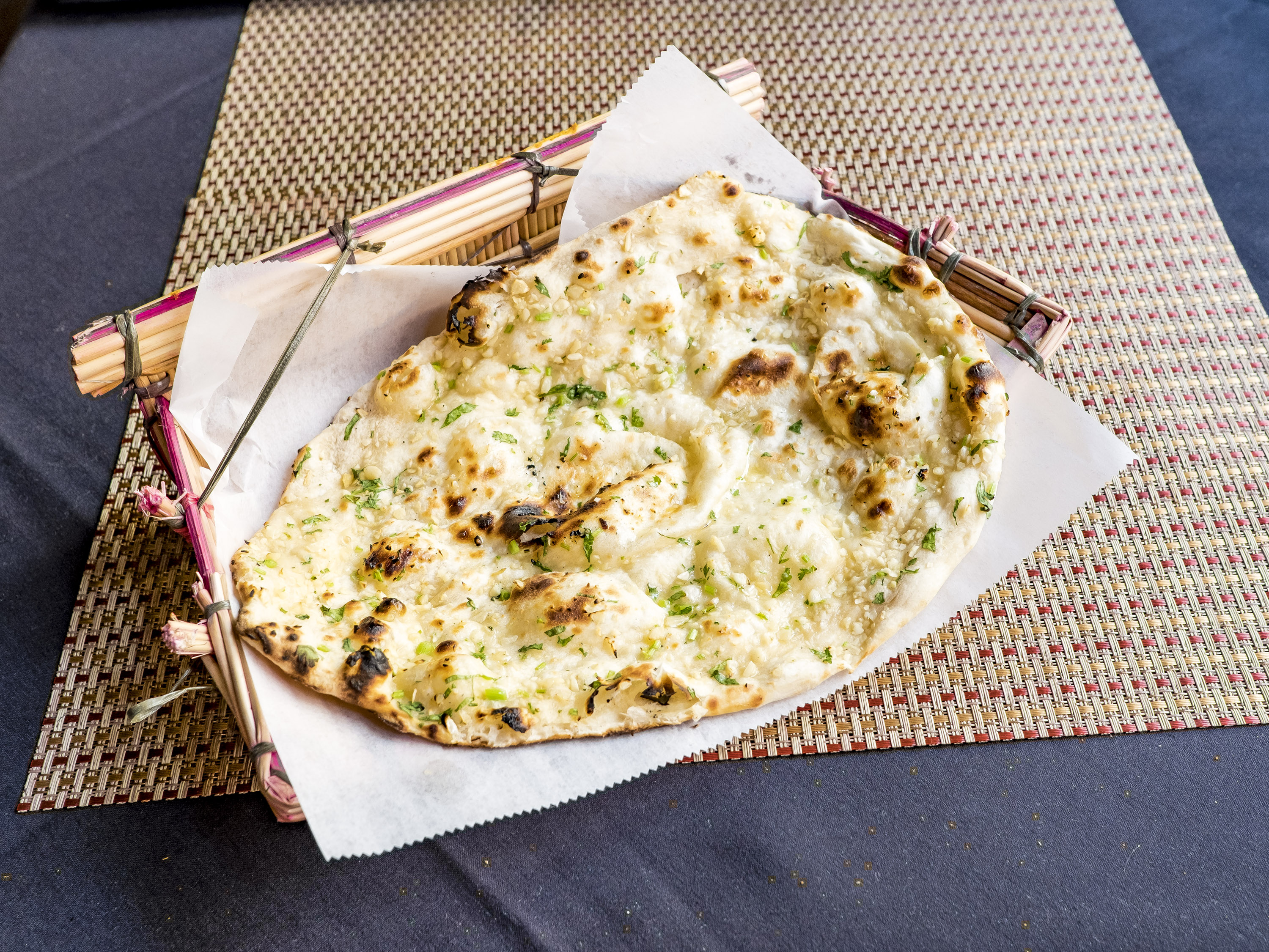 Order Garlic Naan food online from The Mint Leaf store, Baltimore on bringmethat.com