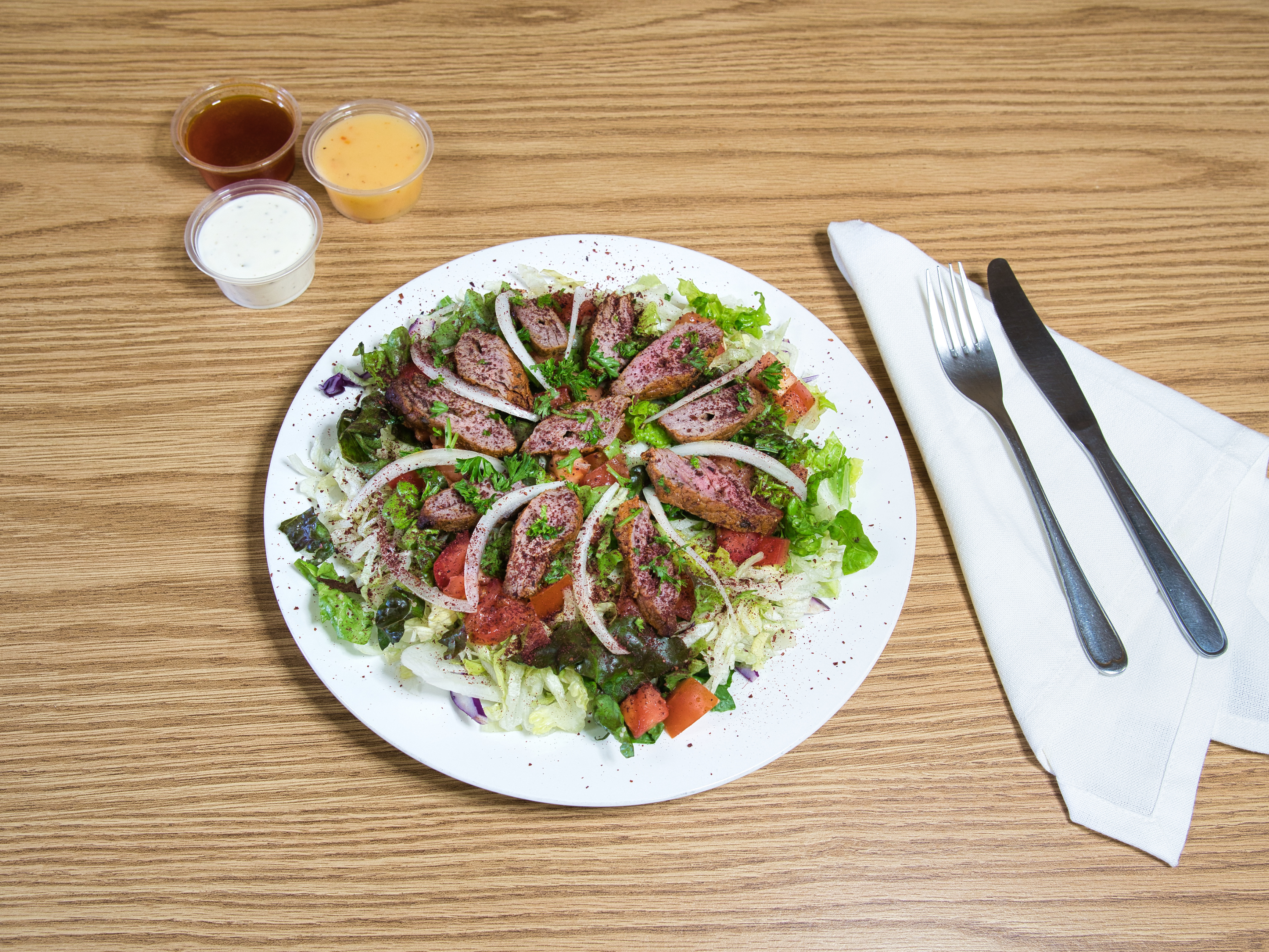 Order Beef Kebob with Green Salad Plate food online from T.O.A Mediterranean store, Fresno on bringmethat.com