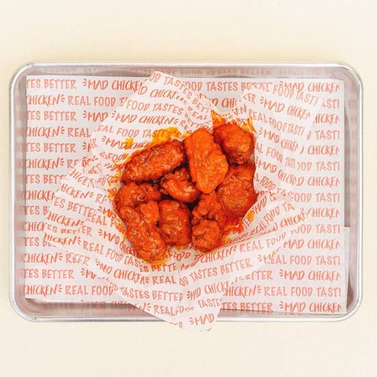 Order .6 BONELESS WINGS * food online from Mad Chicken store, Milwaukee on bringmethat.com