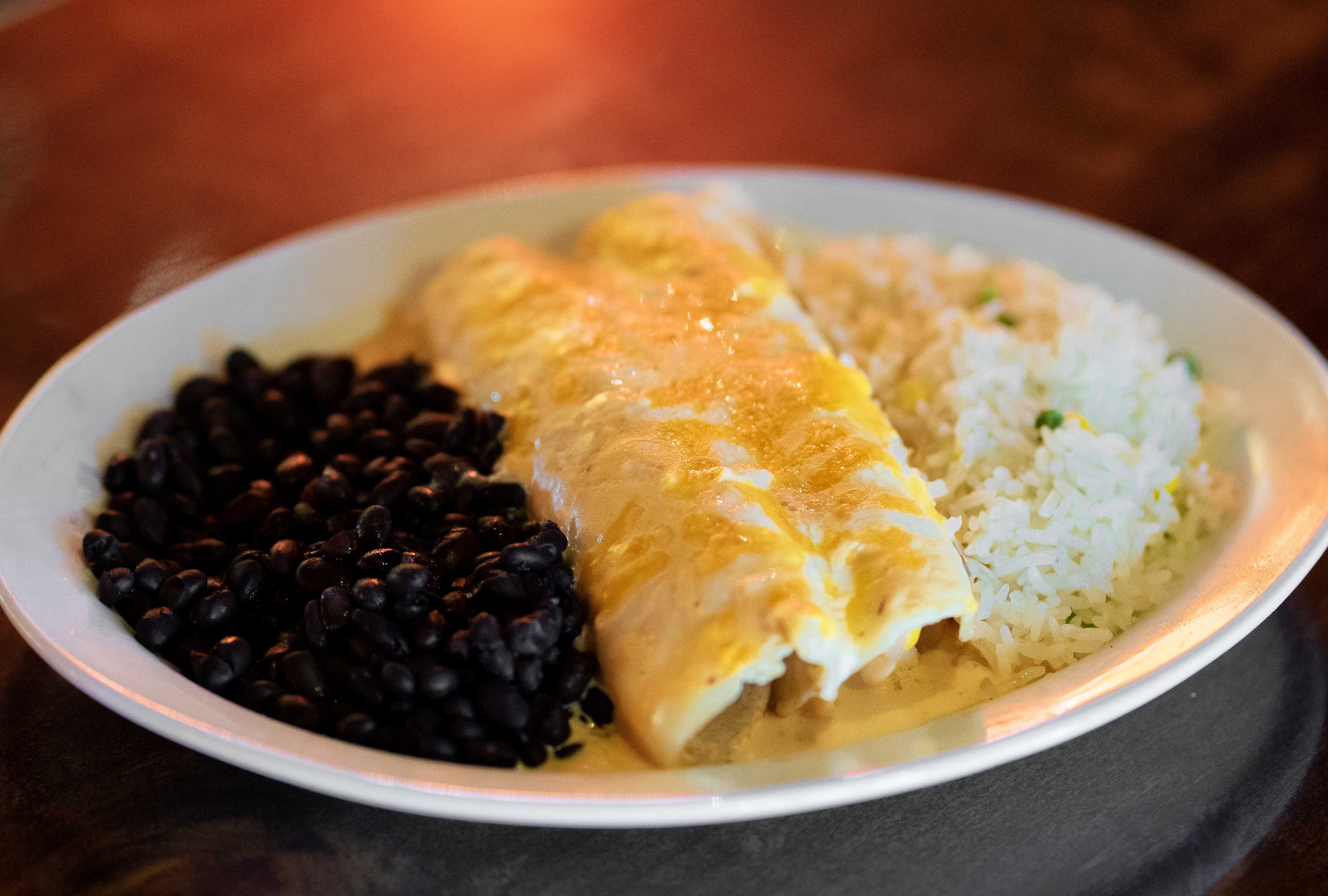 Order 2 Grilled Mahi Enchiladas food online from Calle Tepa store, Tucson on bringmethat.com