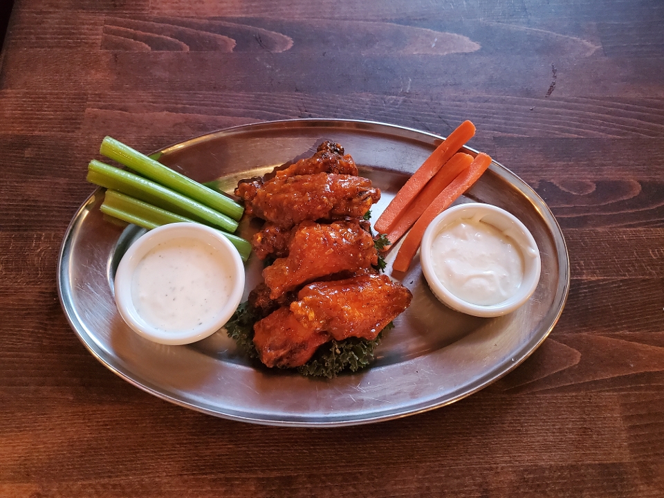 Order Jumbo Buffalo Wings food online from Saddle Ranch Chop House store, West Hollywood on bringmethat.com