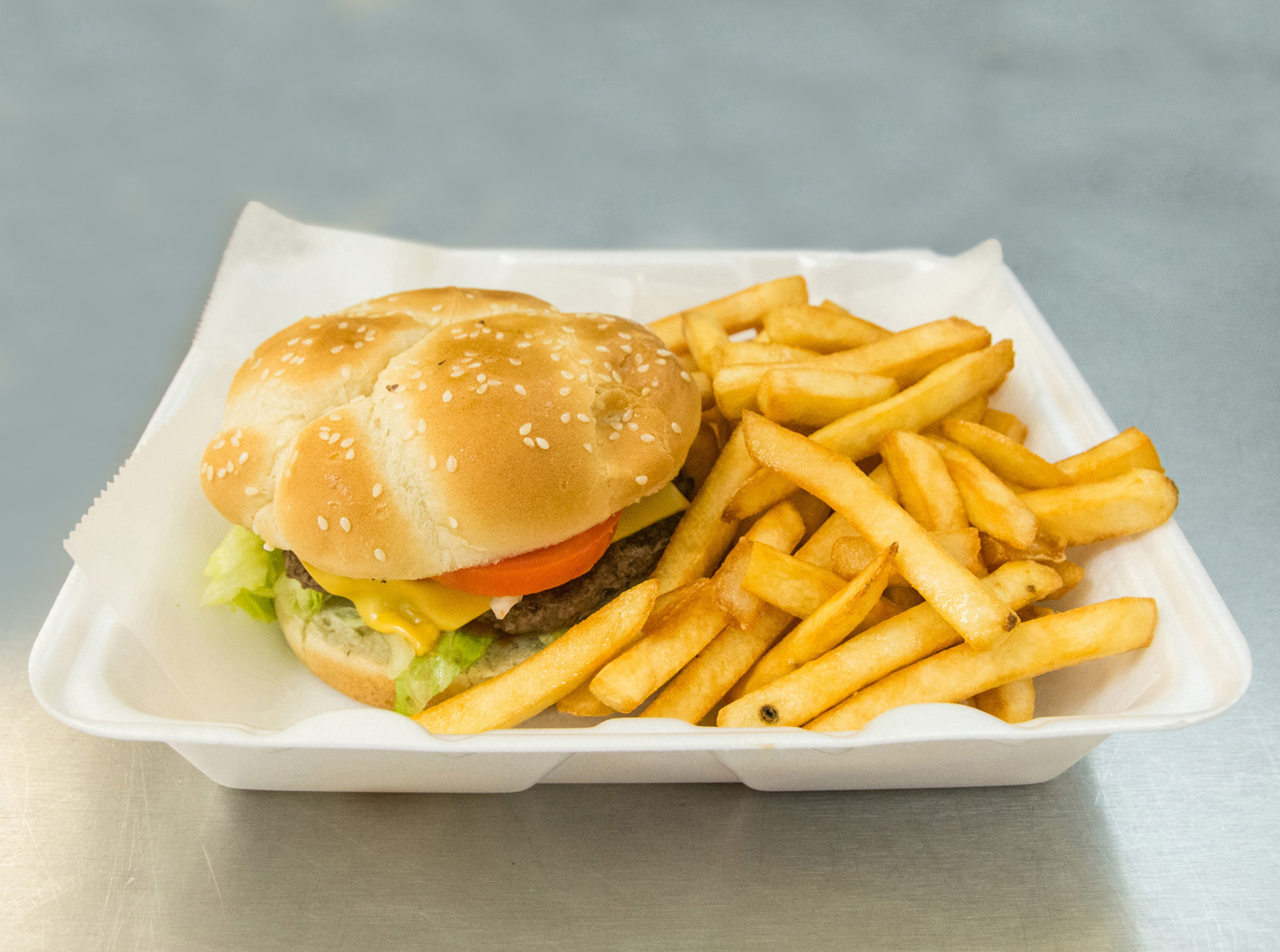 Order 1. Cheese Burger with Fries food online from A-1 Deli And Fried Chicken store, Wilmington on bringmethat.com