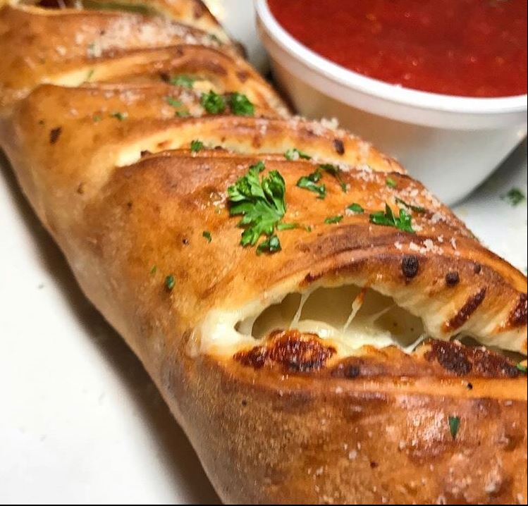 Order Pepperoni and Cheese Stromboli food online from The Pizza Stop store, Collegeville on bringmethat.com