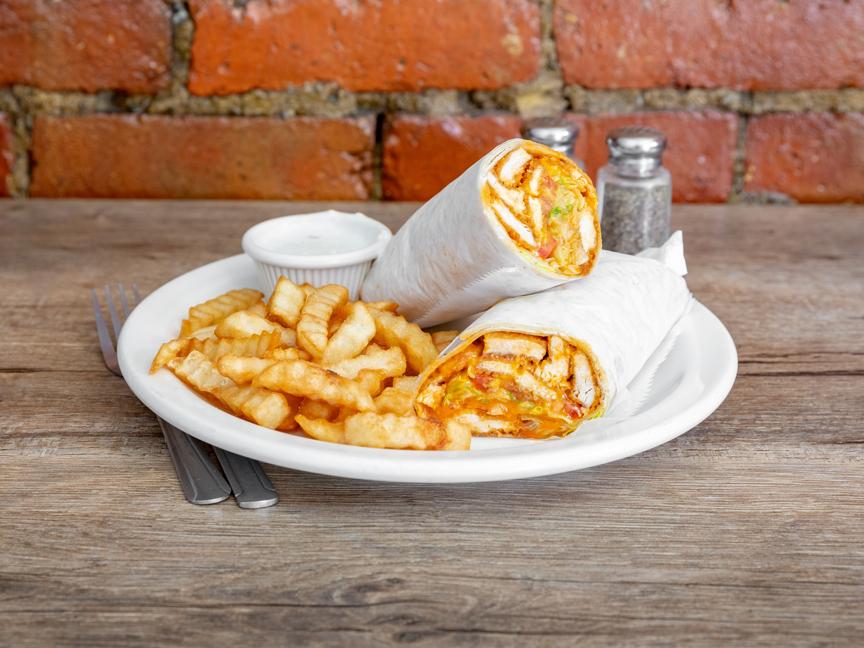 Order Buffalo Chicken Wrap food online from Alondra's Cuisine store, Middletown on bringmethat.com
