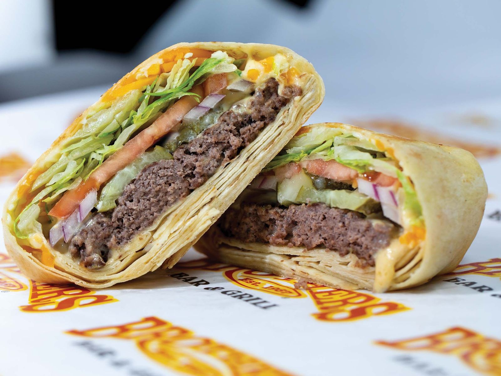 Order Quesadilla Burger food online from Brothers Bar & Grill store, Fort Collins on bringmethat.com
