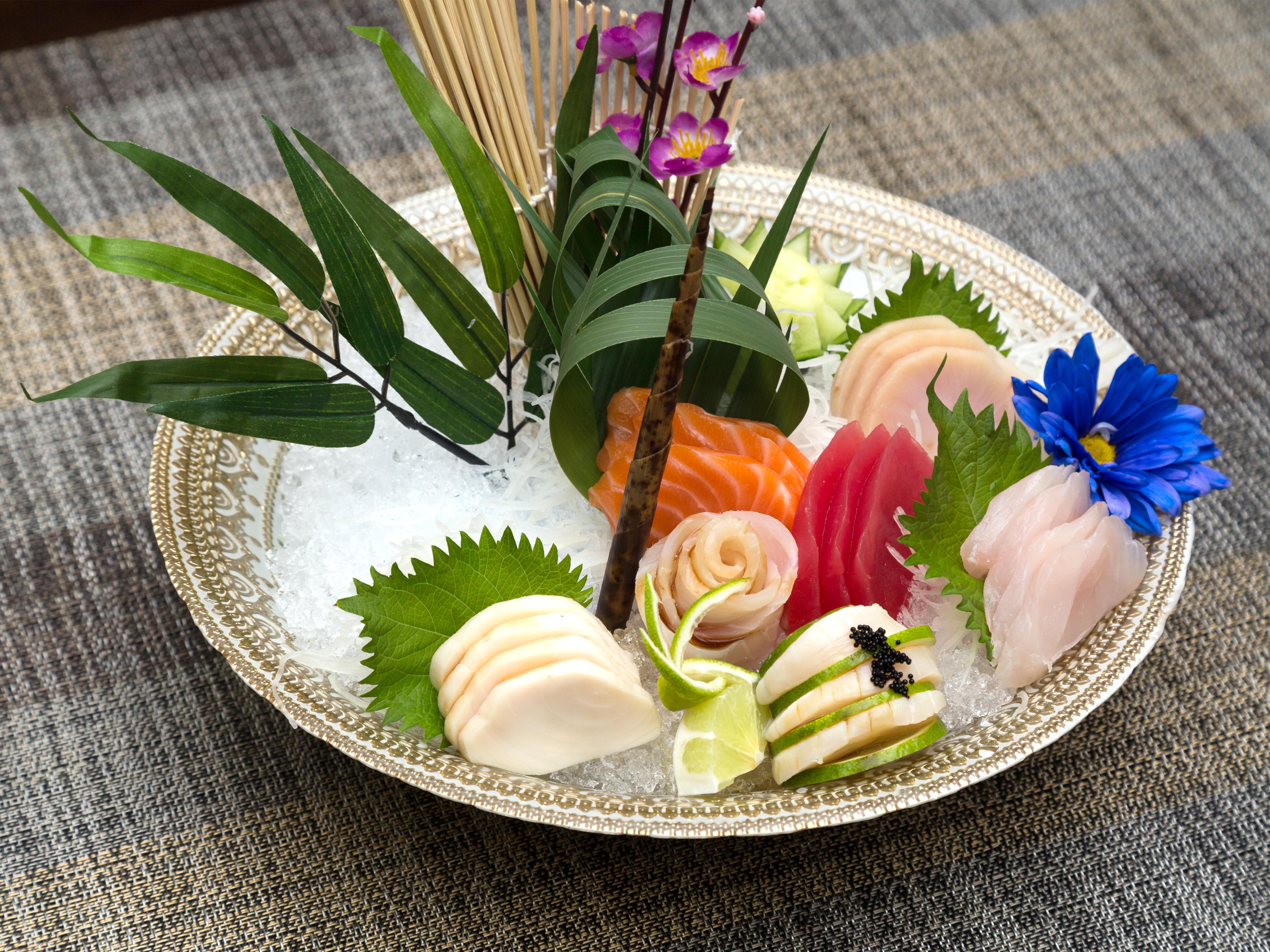 Order B9. Sashimi Dinner food online from Fusion Wok store, Katy on bringmethat.com