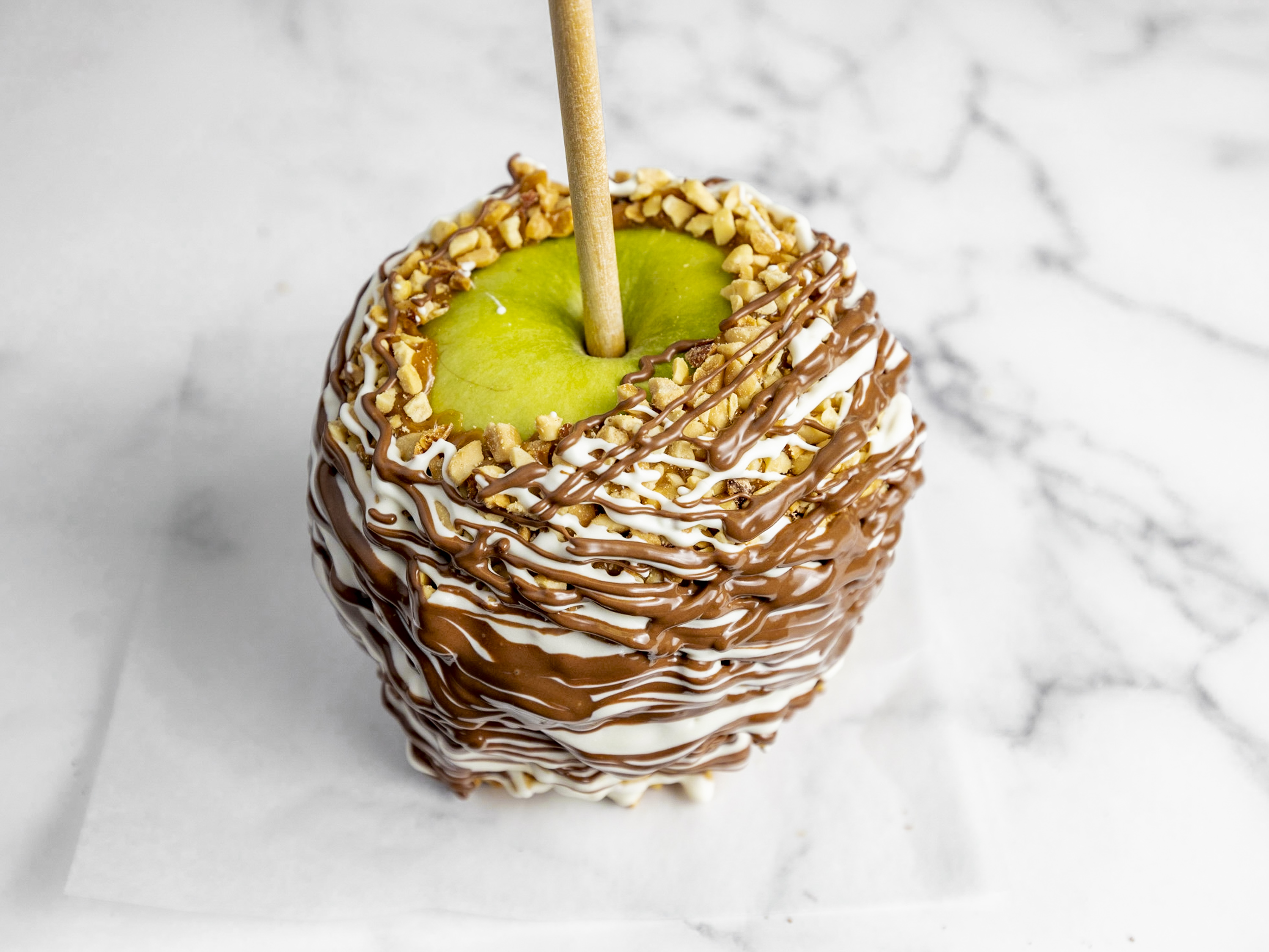 Order Caramel Apple with Peanuts and Chocolate food online from San Francisco Chocolate Store store, San Francisco on bringmethat.com