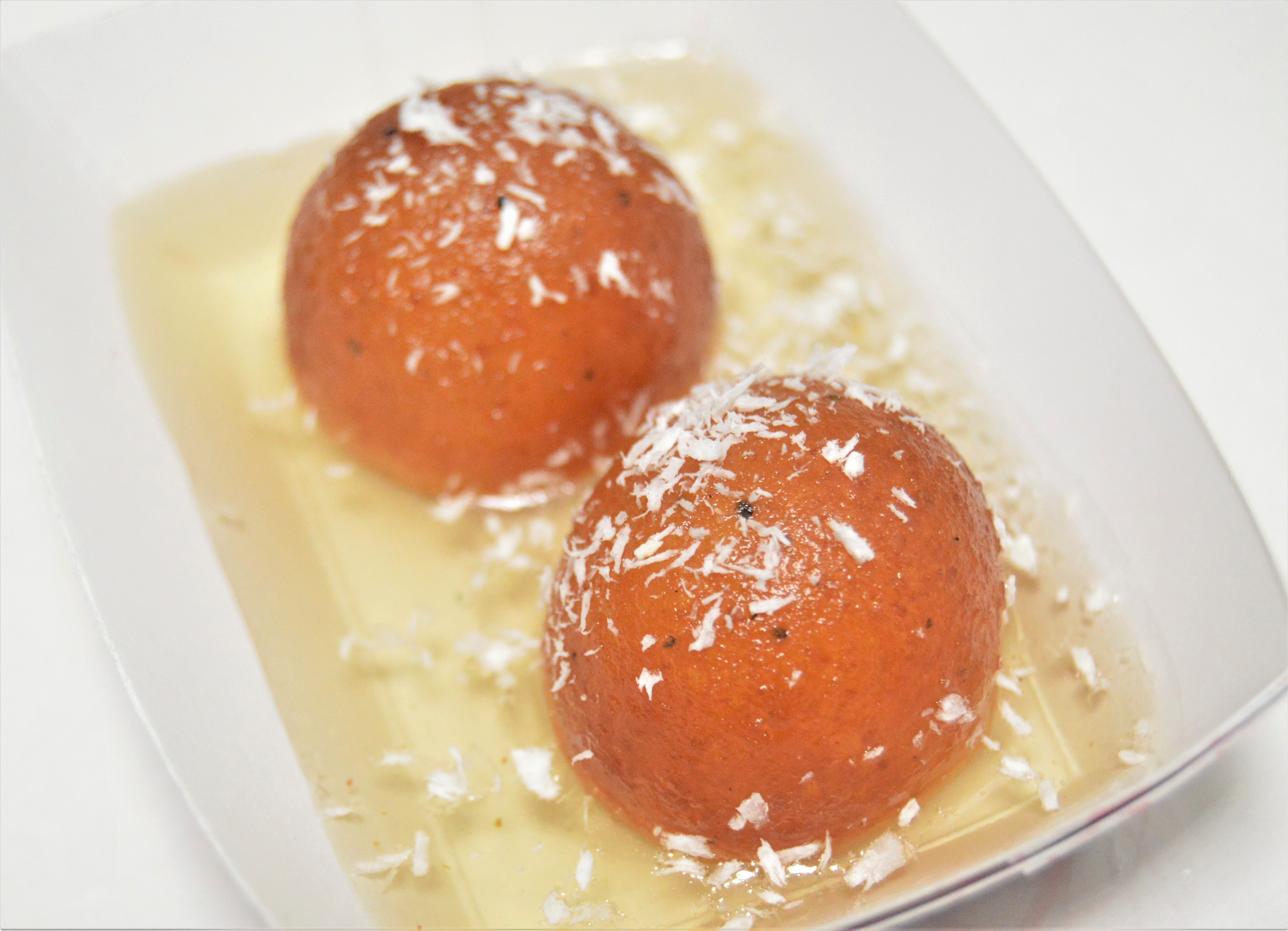 Order 77. Gulab Jamun food online from Salt And Pepper Grill Iii store, Washington on bringmethat.com