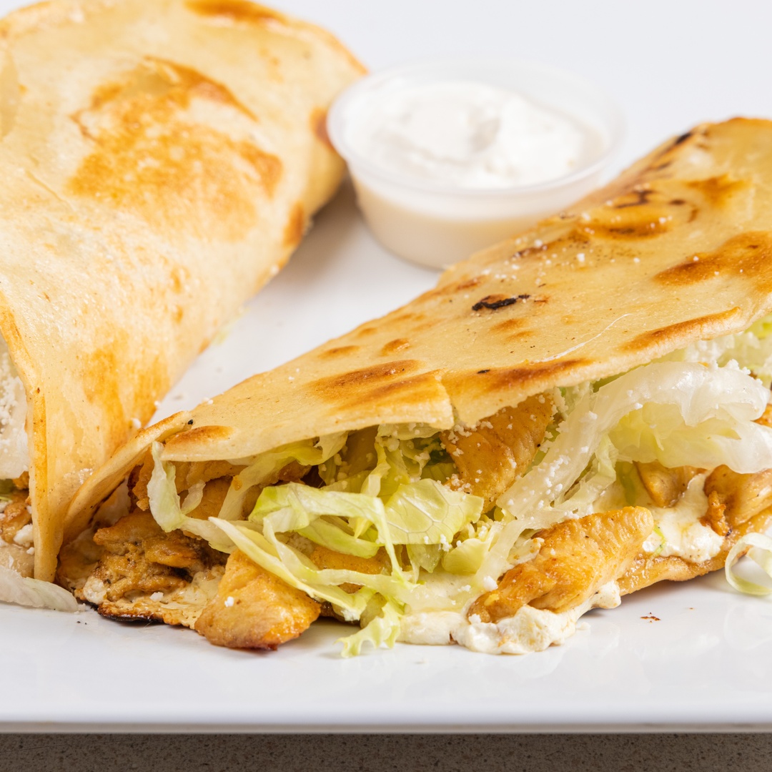Order Chicken Quesadillas (2 Pieces) food online from Homemade Taqueria store, Brooklyn on bringmethat.com
