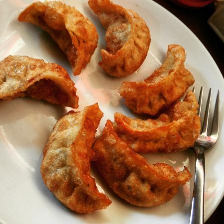 Order Fried Chicken Momo ( Comes with Spicy sauce dip outside)   food online from Empyrean Indian Kitchen store, Hoboken on bringmethat.com