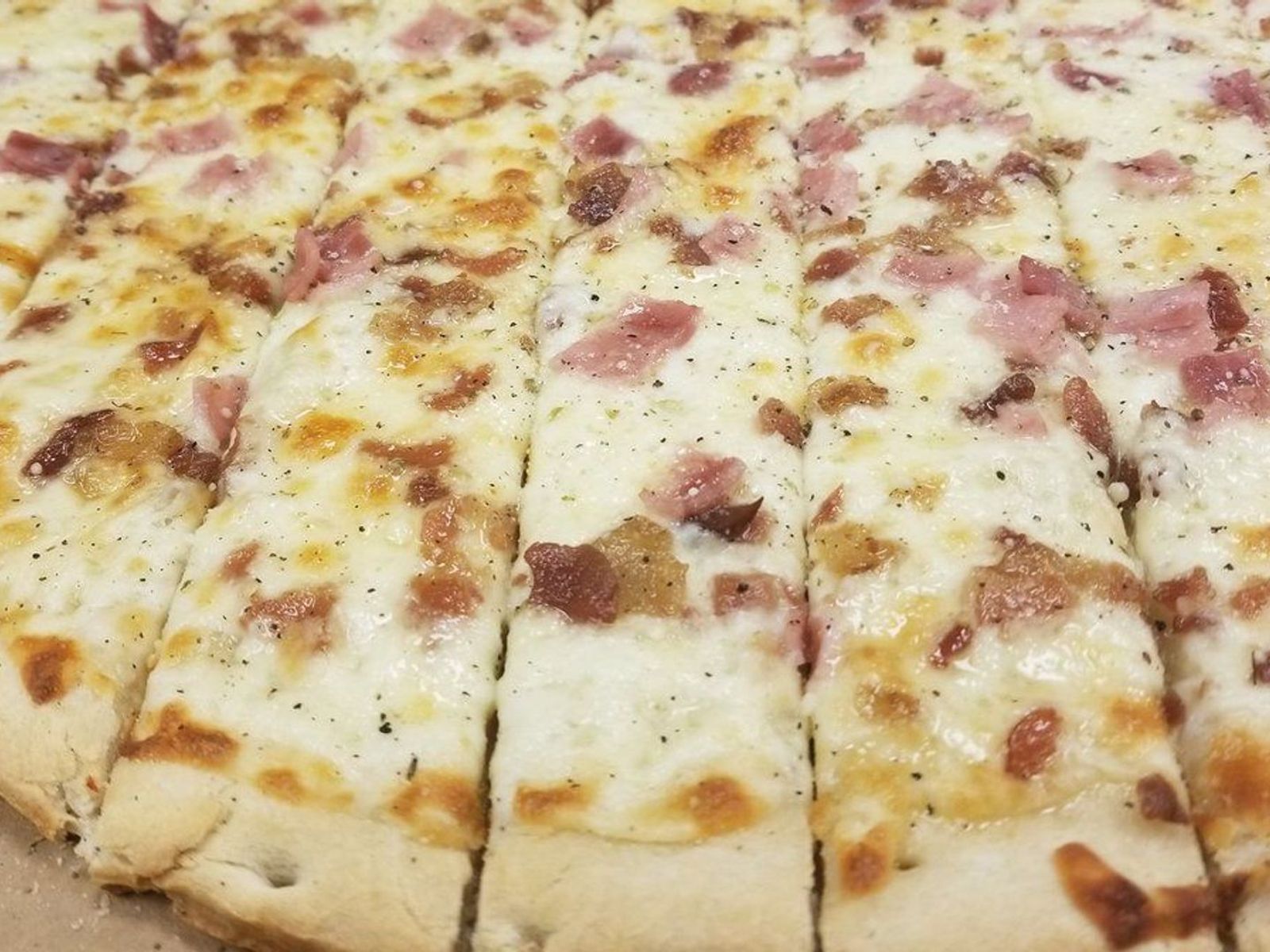 Order CHEESY FLAT-BACON-HAM food online from Rocky's Pizza store, Chicago on bringmethat.com