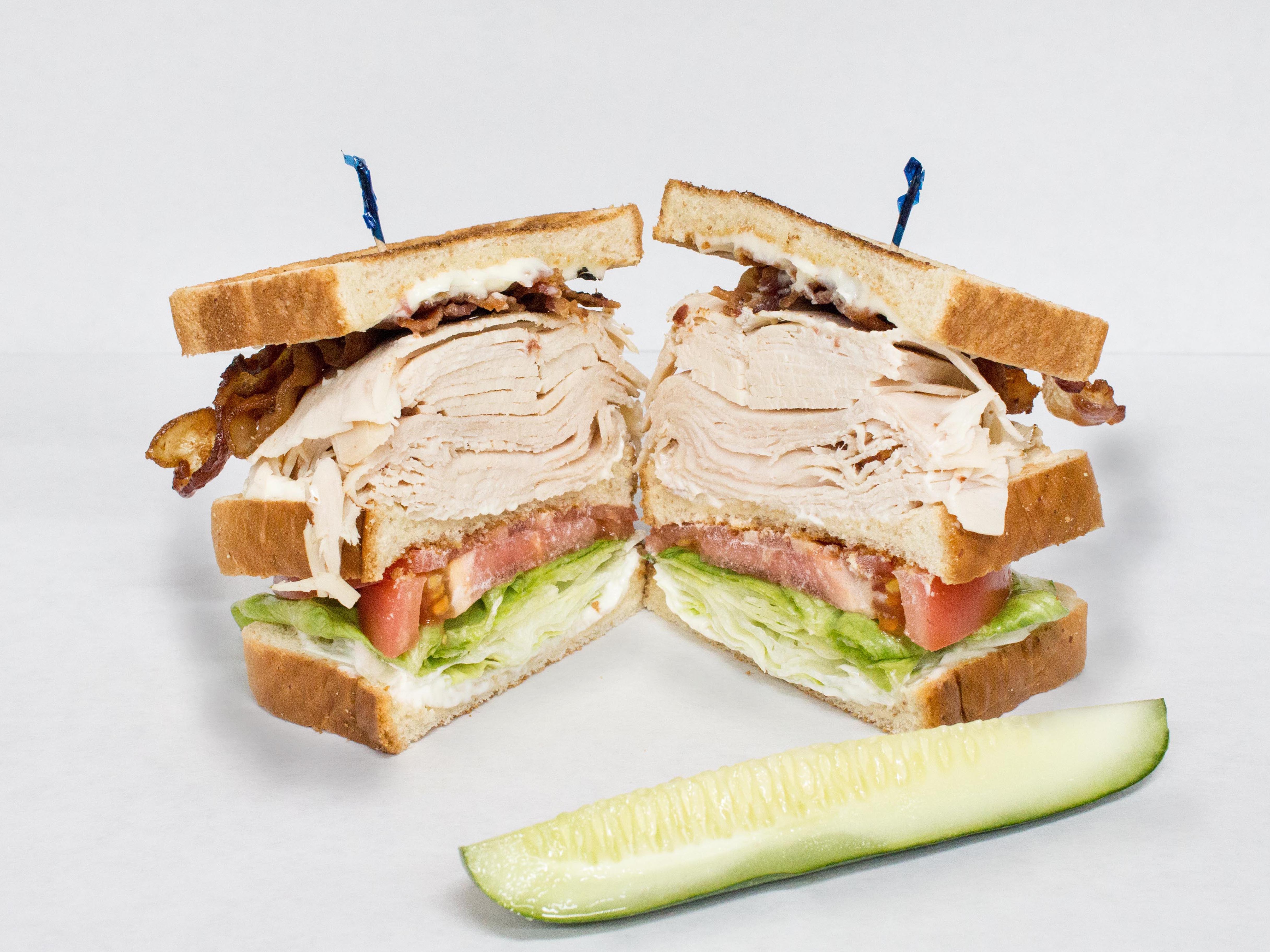 Order 6. Turkey 3-Decker Club Sandwich food online from Al Famous Deli store, Royal Oak on bringmethat.com