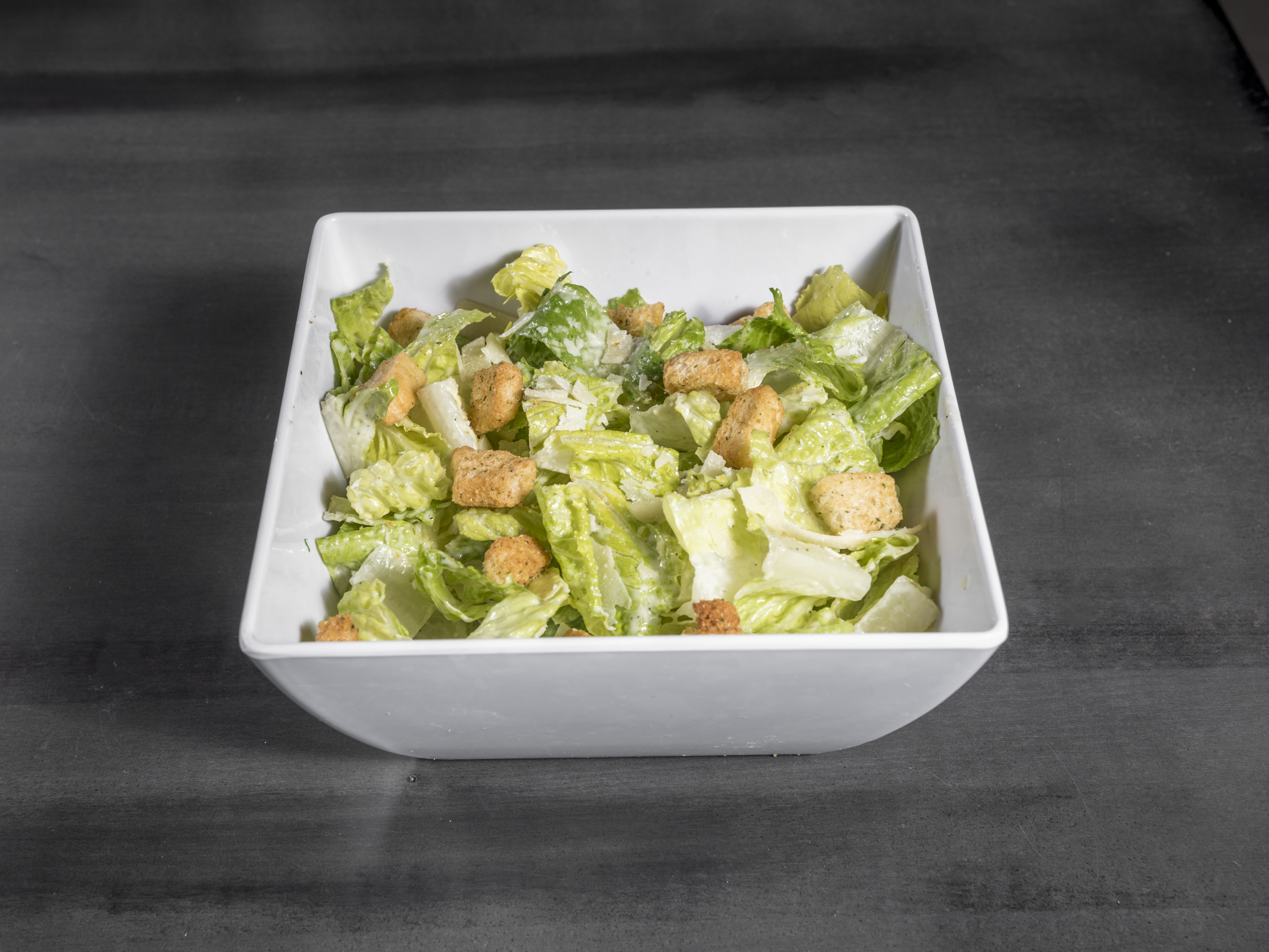 Order Caesar Salad food online from Revel Burger store, Albuquerque on bringmethat.com