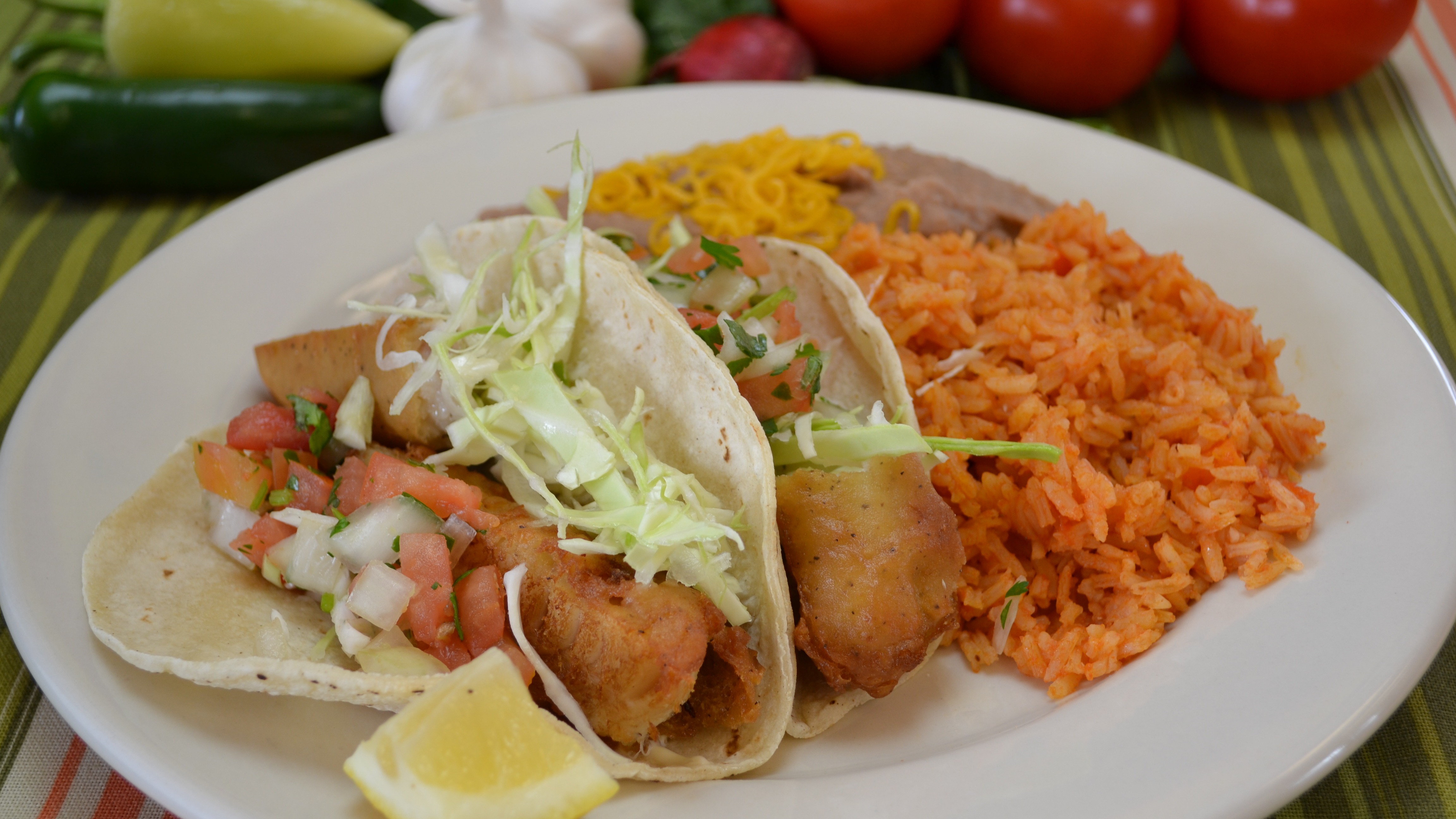 Order 20. Fish Tacos Combo with Rice and Beans food online from Taco Plus store, Tucson on bringmethat.com