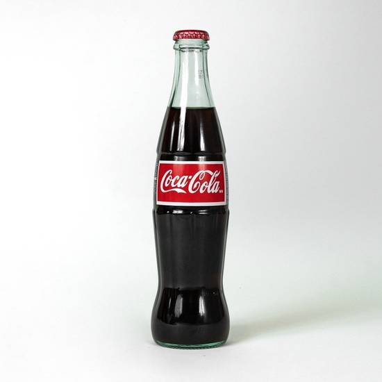 Order Mexican Coke food online from Thick N' Tasty Pizza store, San Francisco on bringmethat.com