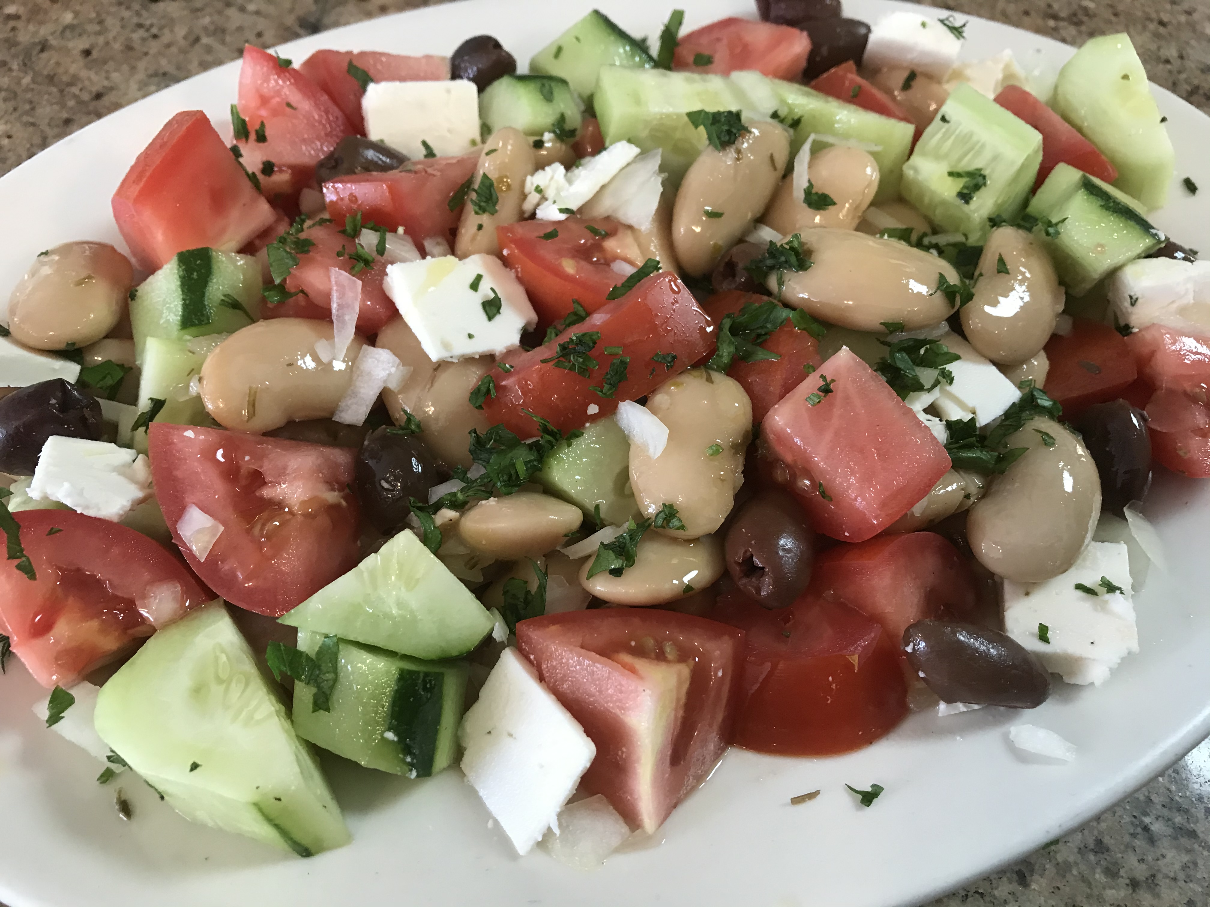 Order Greek salad with giant Lima beans   food online from Gyro Corner store, Flushing on bringmethat.com