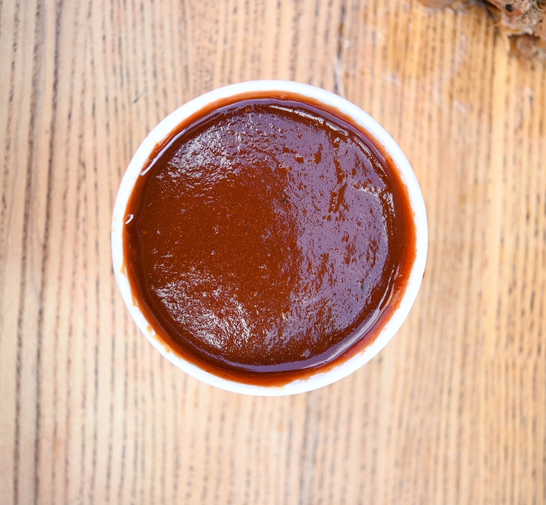 Order 2oz BBQ Sauce (regular) food online from Blu's Barbeque & Bbq Catering store, Dallas on bringmethat.com