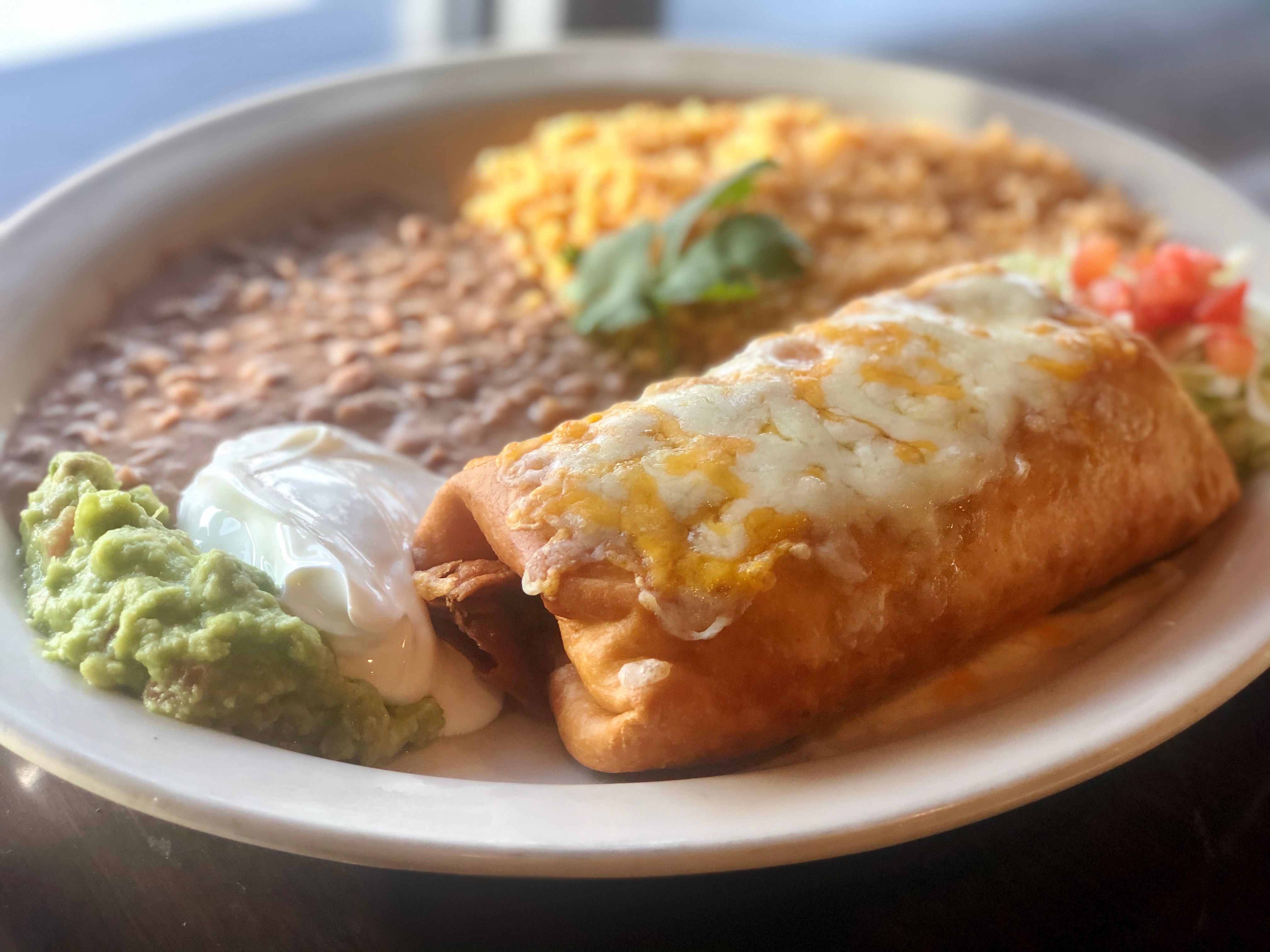 Order Chimichanga food online from Fiesta Mexican Restaurant store, Kennewick on bringmethat.com