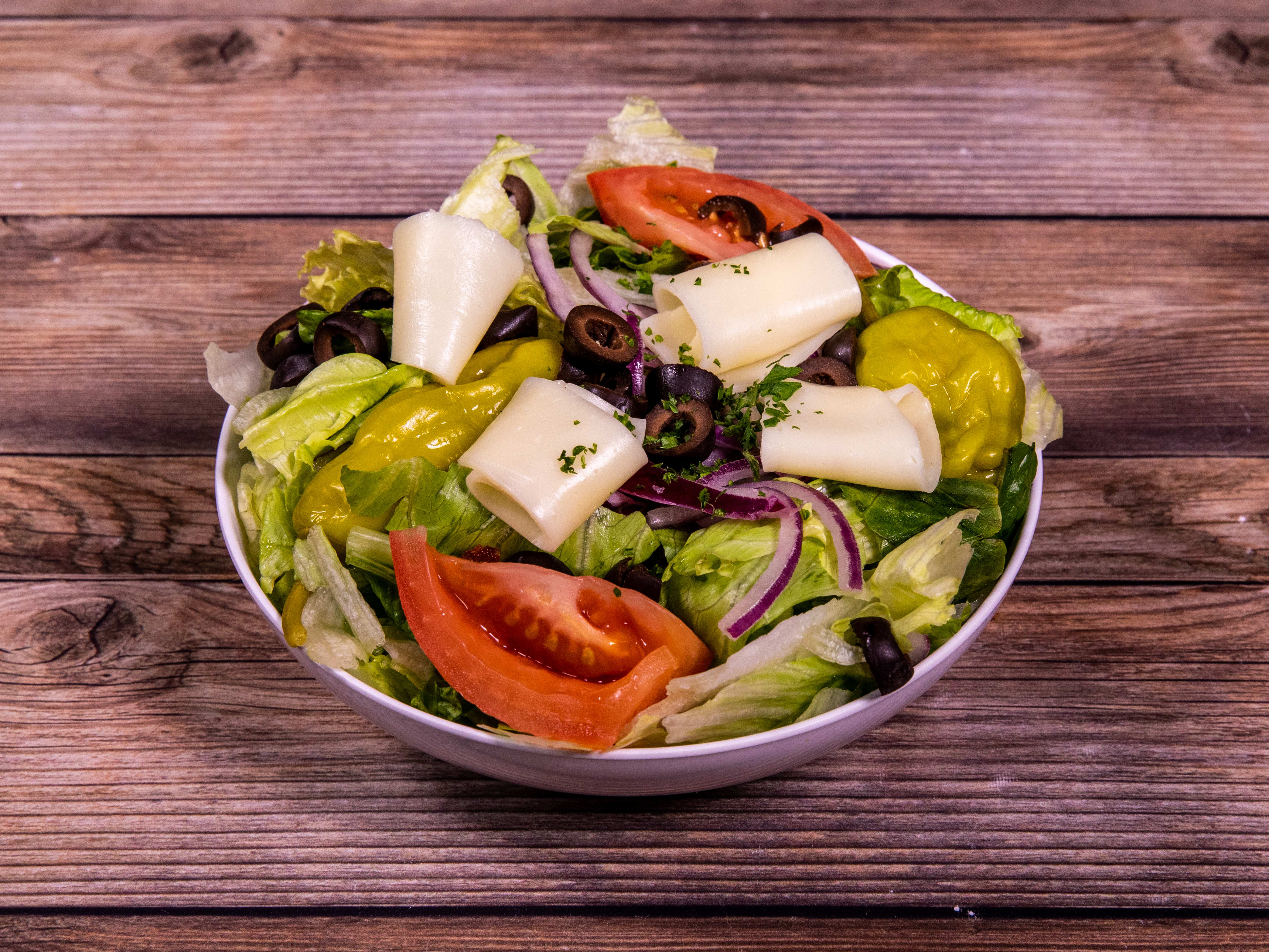 Order Tossed Salad food online from Caprissi Pizza & Pasta store, Garland on bringmethat.com