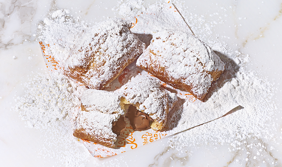 Order 3pc Chocolate Beignets food online from Popeyes store, New Orleans on bringmethat.com