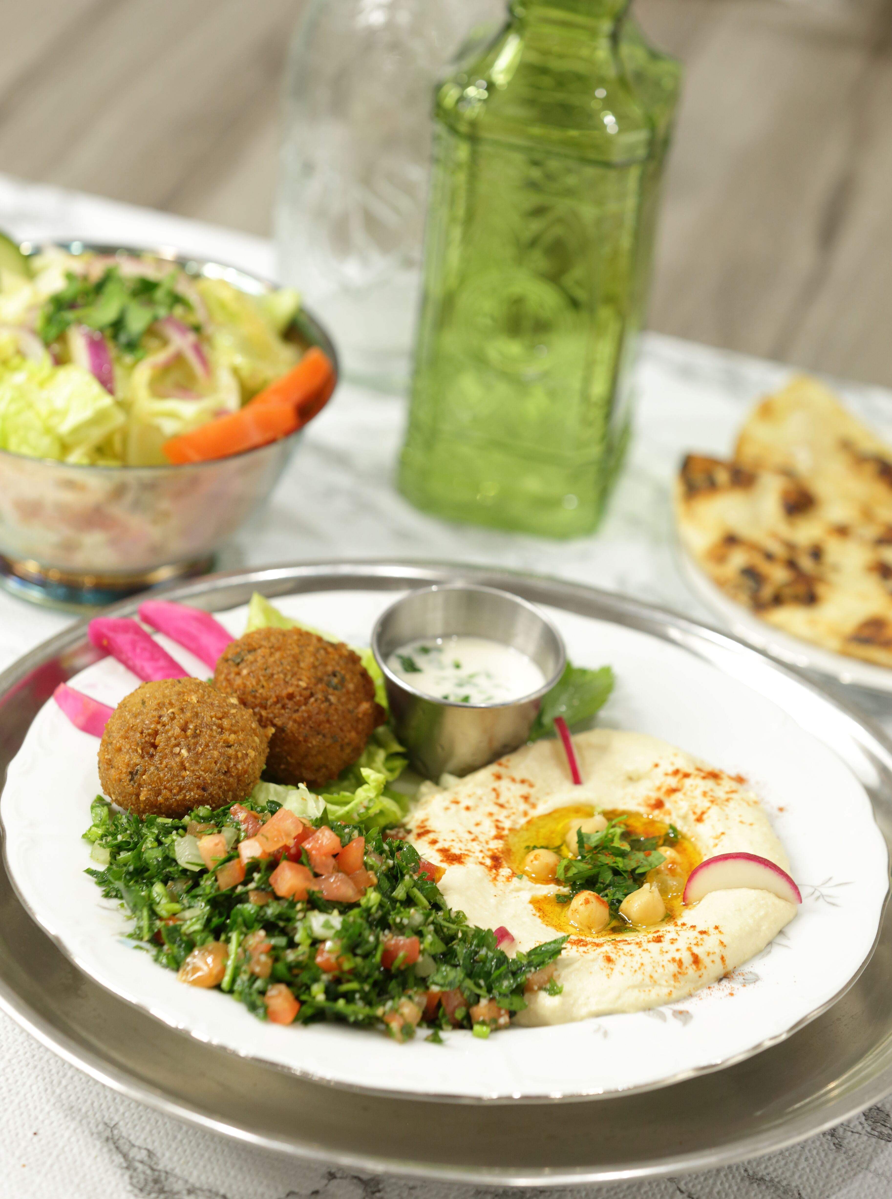 Order Mideast Feast food online from Small World Kitchen store, Detroit on bringmethat.com