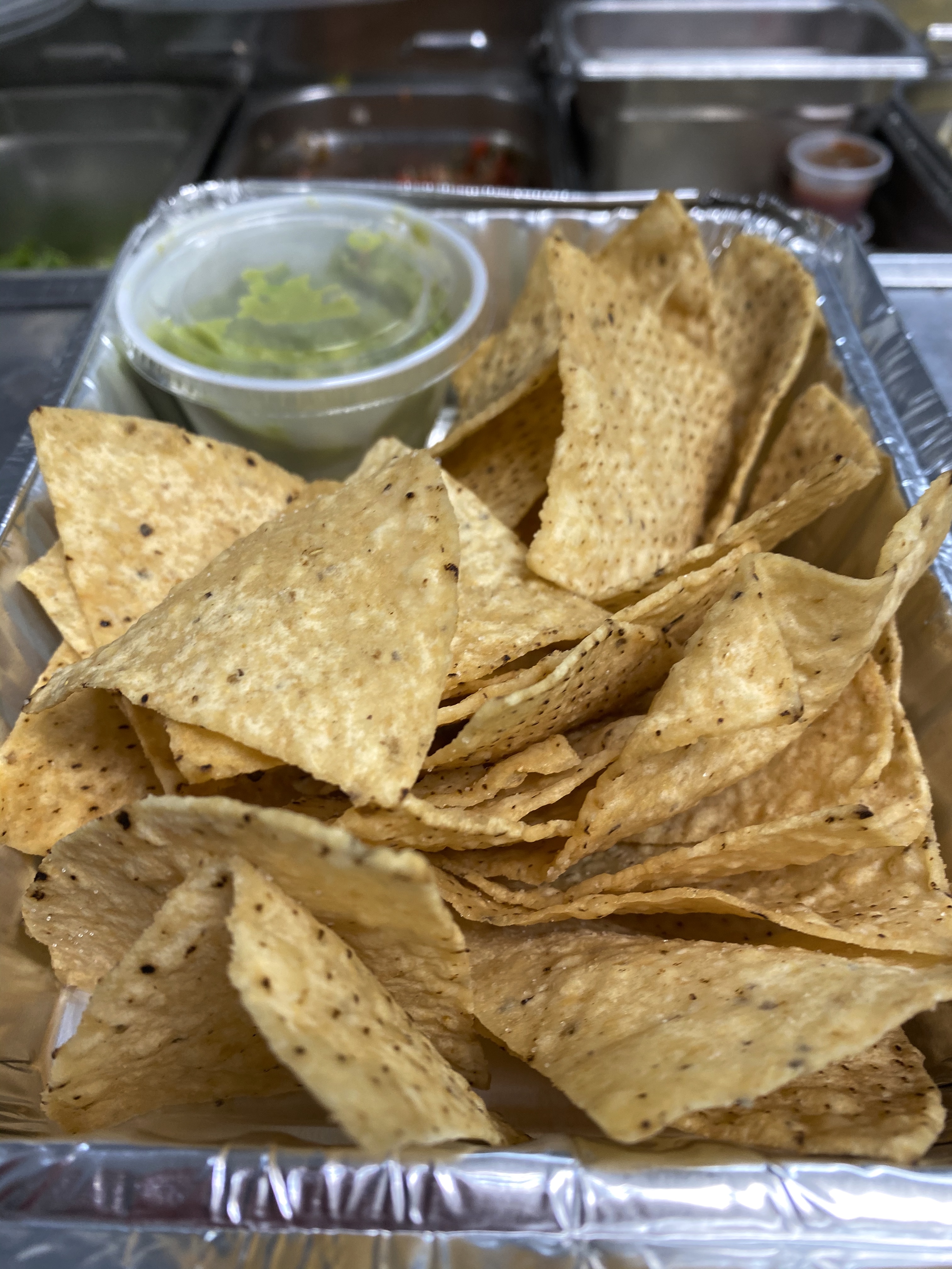 Order GUACAMOLE AND CHIPS  food online from Latin Vegan store, Chicago on bringmethat.com