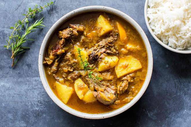 Order Lamb Curry food online from Sansar Indian Restaurant store, Tracy on bringmethat.com