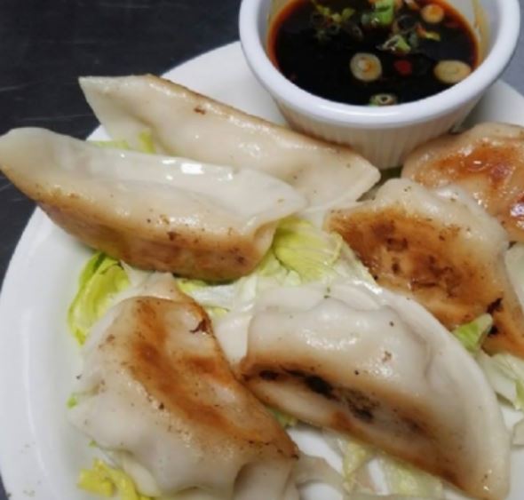 Order Chicken Dumplings food online from China Island Asian Grill store, Flower Mound on bringmethat.com