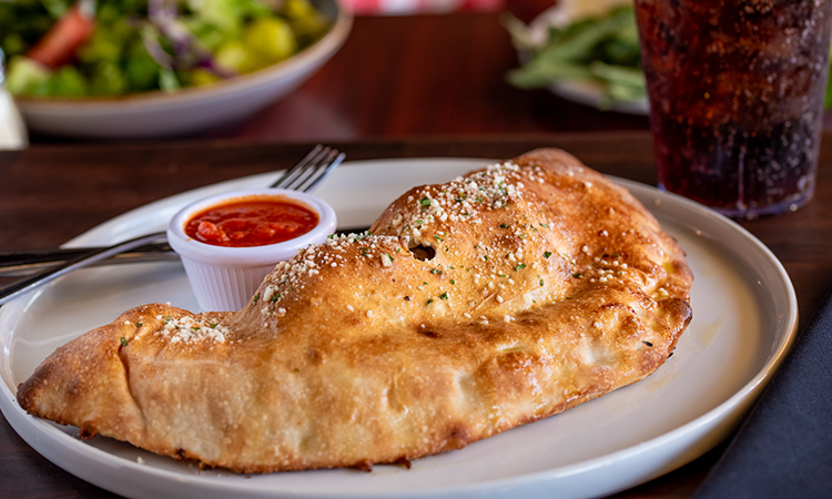 Order Doppio Pepperoni Calzone food online from New York Pizzeria store, Pearland on bringmethat.com