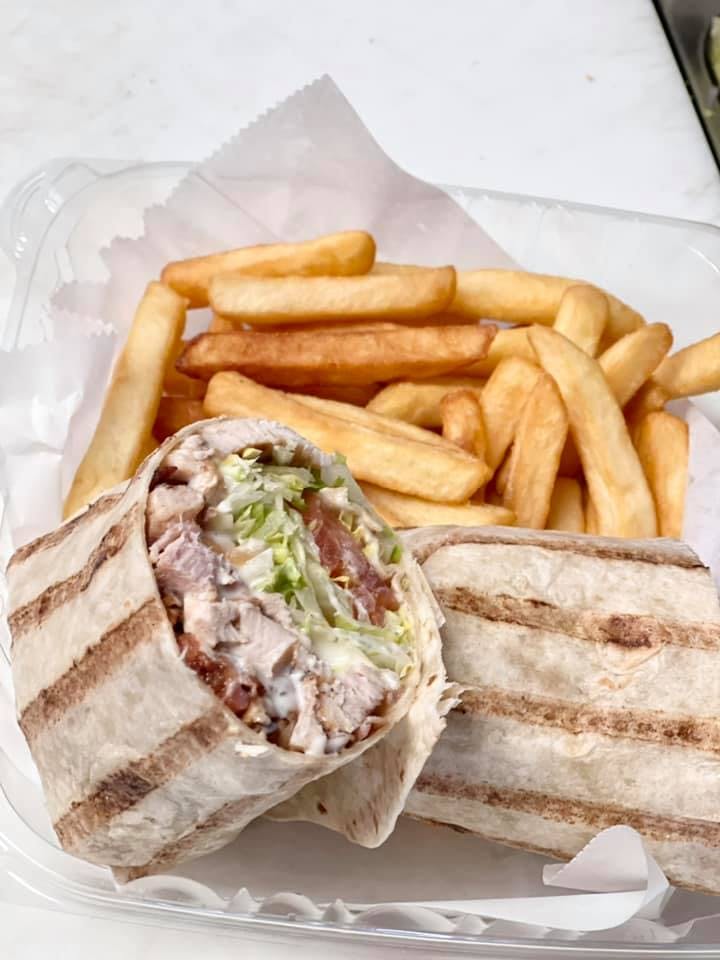 Order Grilled Chicken Wrap - Wrap food online from Vito Pizza store, Mechanicsburg on bringmethat.com