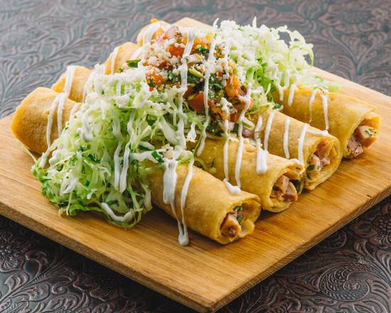Order Rolled Chicken Taquitos food online from Baja Sharkeez store, Hermosa Beach on bringmethat.com