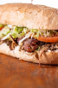 Order BBQ Beef food online from Po Boys & Pickles store, Portland on bringmethat.com