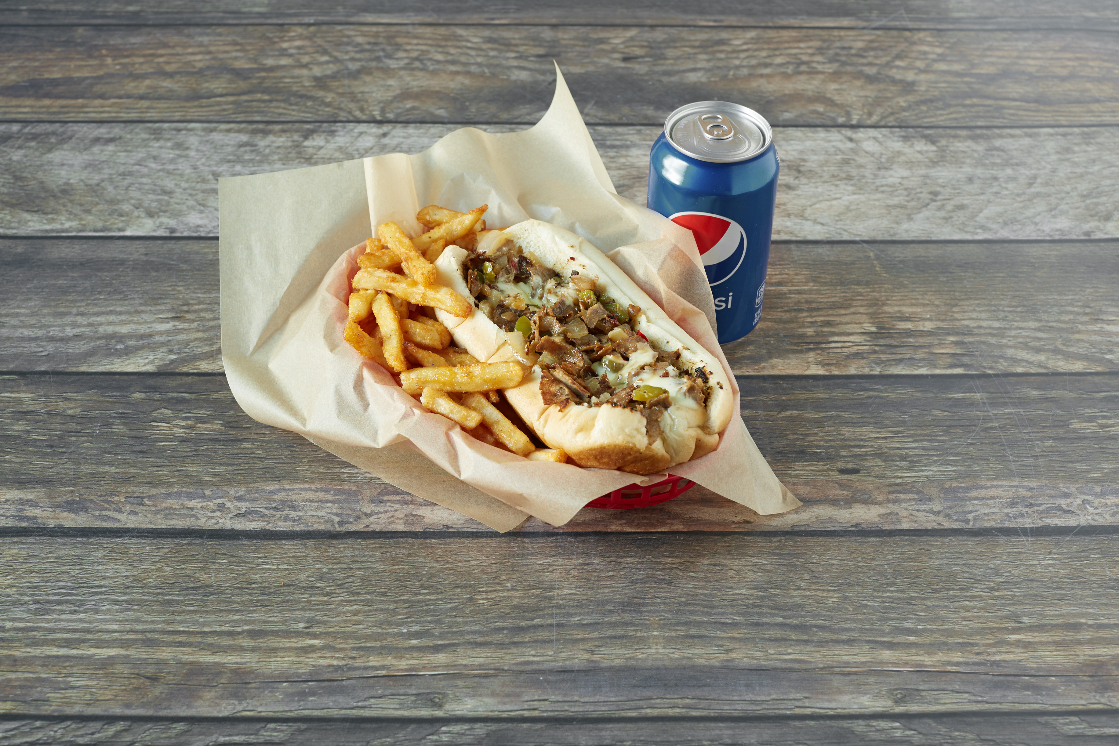 Order Philly Cheesesteak Sandwich food online from Hooks Fish and Chips store, Saint Paul on bringmethat.com
