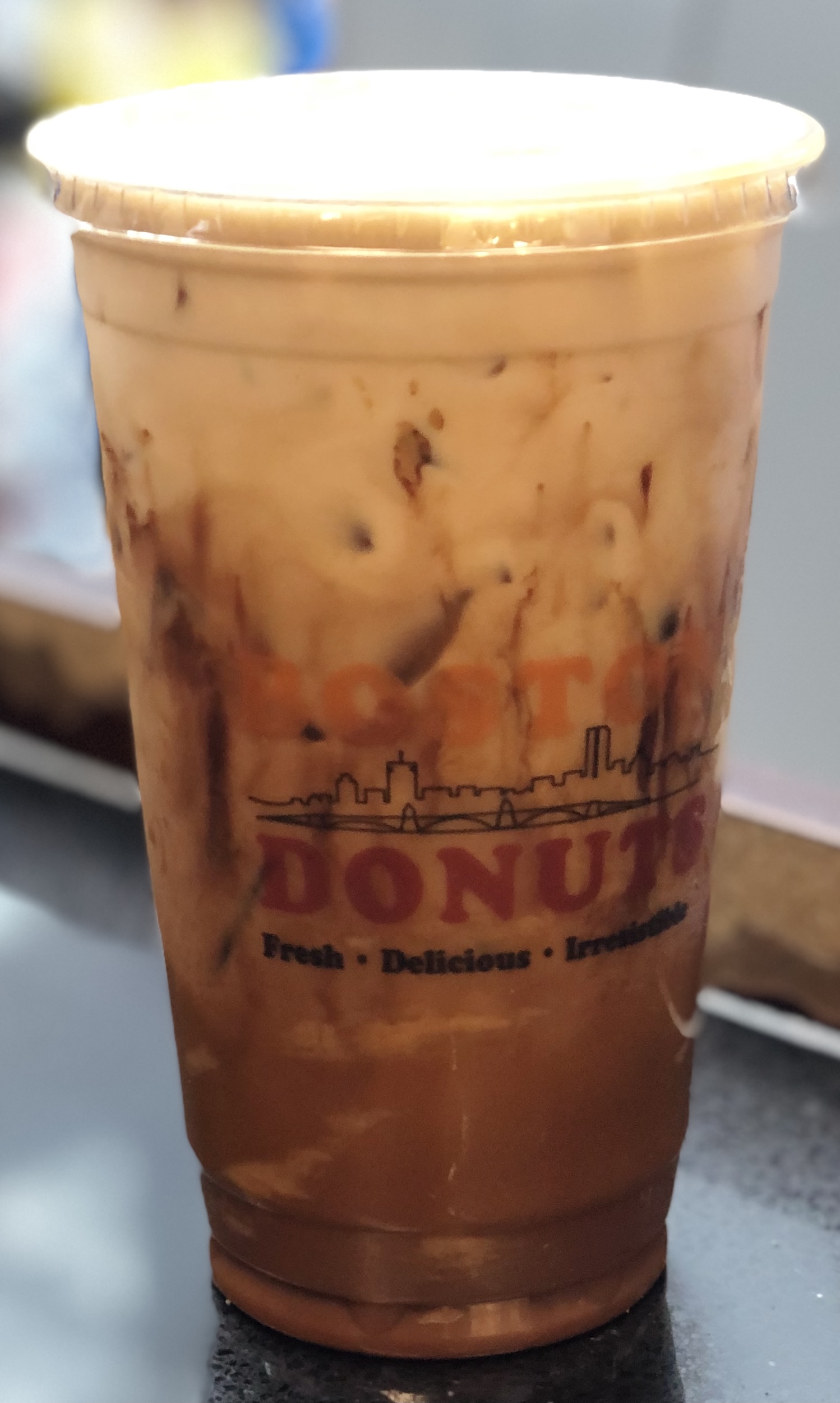 Order Iced latte food online from Boston Donuts store, Fitchburg on bringmethat.com