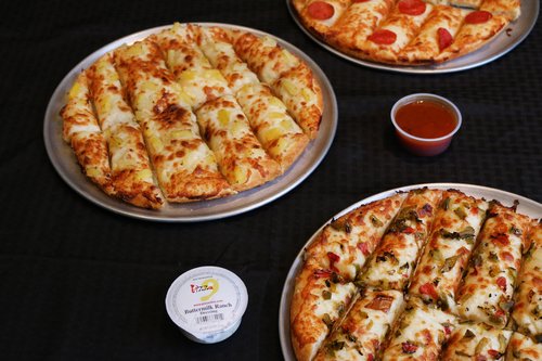 Order 12 Loaded Breadsticks food online from Pizza 9 store, Albuquerque on bringmethat.com